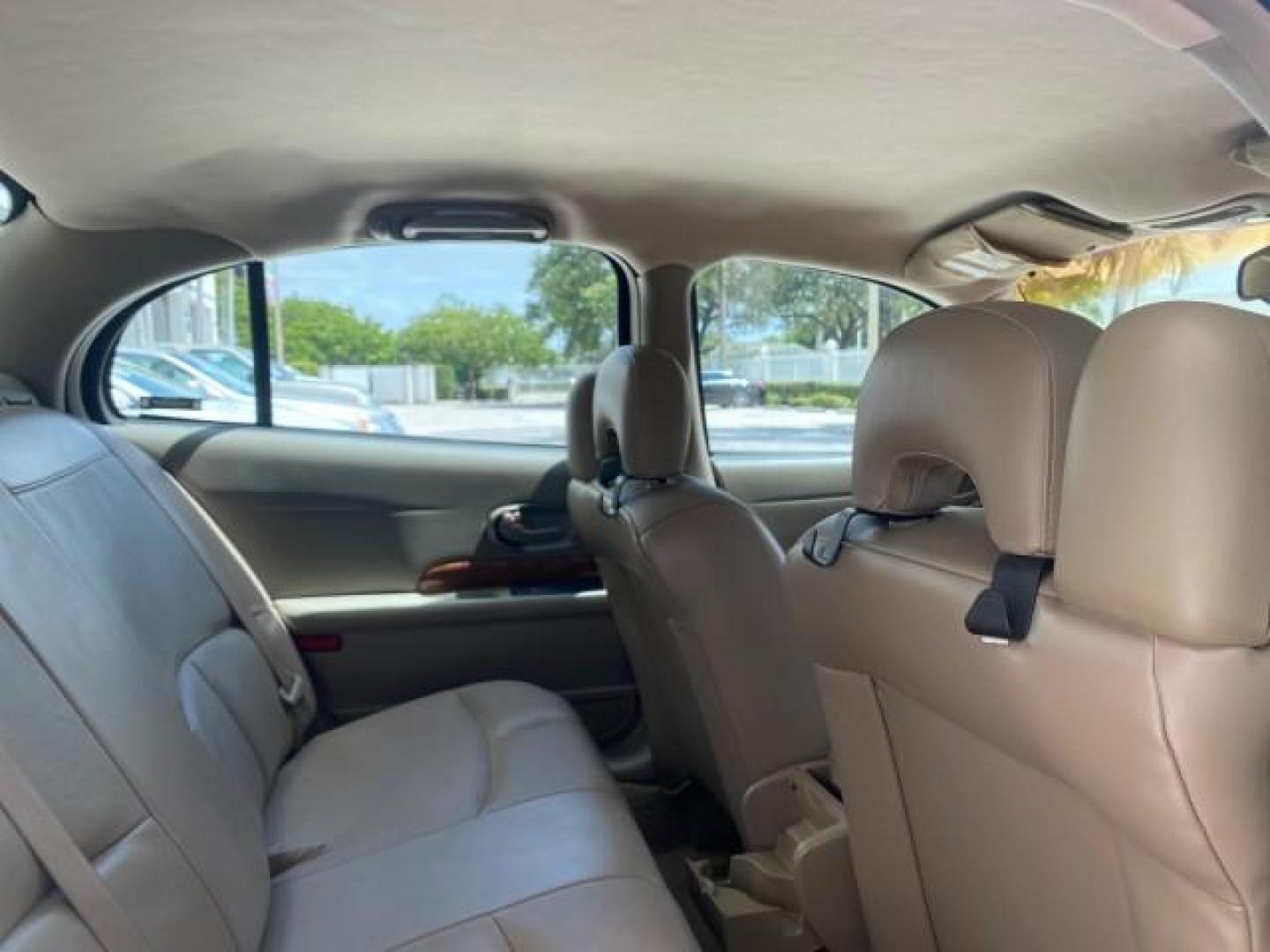 2003 White /Taupe Buick LeSabre Custom LOW MILES 32,880 1 OWNER (1G4HP54K63U) with an 3.8L 3800 V6 SFI Engine engine, Automatic transmission, located at 4701 North Dixie Hwy, Pompano Beach, FL, 33064, (954) 422-2889, 26.240938, -80.123474 - OUR WEBPAGE FLORIDACARS1.COM HAS OVER 100 PHOTOS AND FREE CARFAX LINK 2003 BUICK LESABRE CUSTOM VIN: 1G4HP54K63U139534 1 G 4 H P 5 4 K 6 3 U 1 3 9 5 3 4 SEDAN 4 DR 3.8L V6 F 12V 29 mpg GASOLINE FRONT WHEEL DRIVE Top Features Alloy Wheels Cloth Seats Leather Seats Luxury Package Basic Features ABS Br - Photo#89