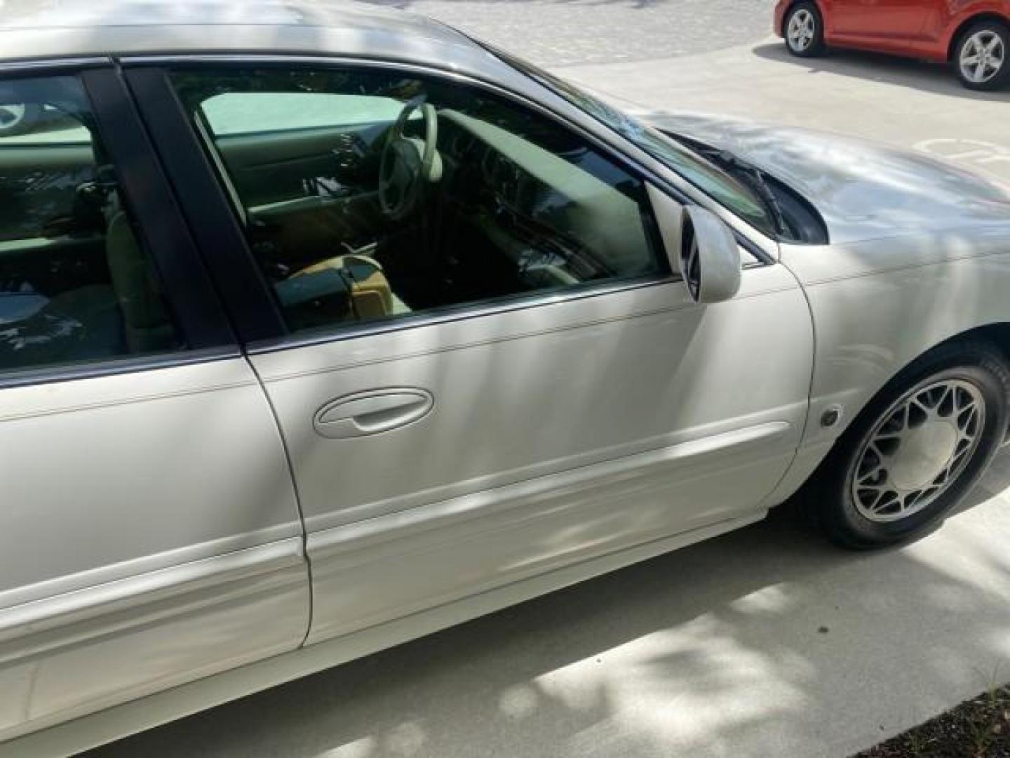 2003 White /Taupe Buick LeSabre Custom LOW MILES 32,880 1 OWNER (1G4HP54K63U) with an 3.8L 3800 V6 SFI Engine engine, Automatic transmission, located at 4701 North Dixie Hwy, Pompano Beach, FL, 33064, (954) 422-2889, 26.240938, -80.123474 - OUR WEBPAGE FLORIDACARS1.COM HAS OVER 100 PHOTOS AND FREE CARFAX LINK 2003 BUICK LESABRE CUSTOM VIN: 1G4HP54K63U139534 1 G 4 H P 5 4 K 6 3 U 1 3 9 5 3 4 SEDAN 4 DR 3.8L V6 F 12V 29 mpg GASOLINE FRONT WHEEL DRIVE Top Features Alloy Wheels Cloth Seats Leather Seats Luxury Package Basic Features ABS Br - Photo#92