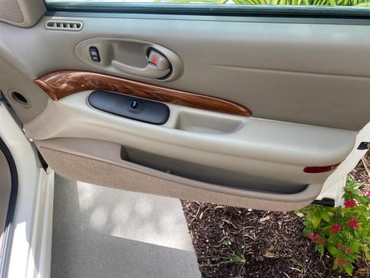 2003 White /Taupe Buick LeSabre Custom LOW MILES 32,880 1 OWNER (1G4HP54K63U) with an 3.8L 3800 V6 SFI Engine engine, Automatic transmission, located at 4701 North Dixie Hwy, Pompano Beach, FL, 33064, (954) 422-2889, 26.240938, -80.123474 - OUR WEBPAGE FLORIDACARS1.COM HAS OVER 100 PHOTOS AND FREE CARFAX LINK 2003 BUICK LESABRE CUSTOM VIN: 1G4HP54K63U139534 1 G 4 H P 5 4 K 6 3 U 1 3 9 5 3 4 SEDAN 4 DR 3.8L V6 F 12V 29 mpg GASOLINE FRONT WHEEL DRIVE Top Features Alloy Wheels Cloth Seats Leather Seats Luxury Package Basic Features ABS Br - Photo#94