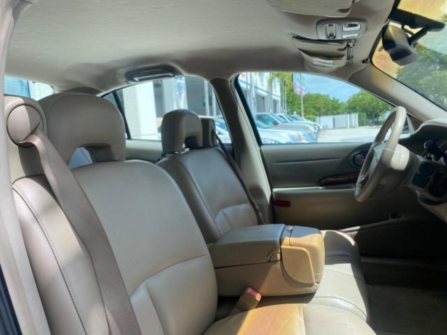 2003 White /Taupe Buick LeSabre Custom LOW MILES 32,880 1 OWNER (1G4HP54K63U) with an 3.8L 3800 V6 SFI Engine engine, Automatic transmission, located at 4701 North Dixie Hwy, Pompano Beach, FL, 33064, (954) 422-2889, 26.240938, -80.123474 - OUR WEBPAGE FLORIDACARS1.COM HAS OVER 100 PHOTOS AND FREE CARFAX LINK 2003 BUICK LESABRE CUSTOM VIN: 1G4HP54K63U139534 1 G 4 H P 5 4 K 6 3 U 1 3 9 5 3 4 SEDAN 4 DR 3.8L V6 F 12V 29 mpg GASOLINE FRONT WHEEL DRIVE Top Features Alloy Wheels Cloth Seats Leather Seats Luxury Package Basic Features ABS Br - Photo#95