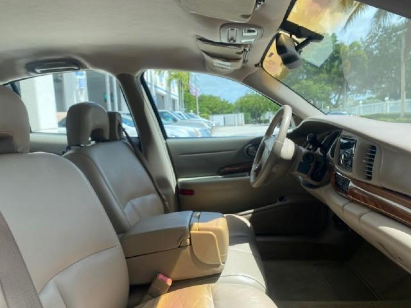 2003 White /Taupe Buick LeSabre Custom LOW MILES 32,880 1 OWNER (1G4HP54K63U) with an 3.8L 3800 V6 SFI Engine engine, Automatic transmission, located at 4701 North Dixie Hwy, Pompano Beach, FL, 33064, (954) 422-2889, 26.240938, -80.123474 - OUR WEBPAGE FLORIDACARS1.COM HAS OVER 100 PHOTOS AND FREE CARFAX LINK 2003 BUICK LESABRE CUSTOM VIN: 1G4HP54K63U139534 1 G 4 H P 5 4 K 6 3 U 1 3 9 5 3 4 SEDAN 4 DR 3.8L V6 F 12V 29 mpg GASOLINE FRONT WHEEL DRIVE Top Features Alloy Wheels Cloth Seats Leather Seats Luxury Package Basic Features ABS Br - Photo#97