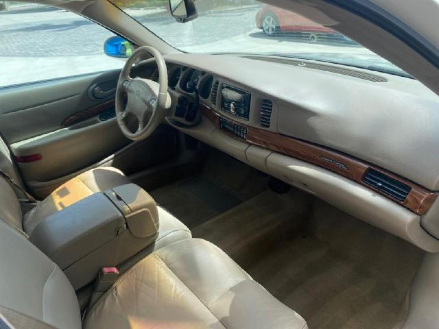 2003 White /Taupe Buick LeSabre Custom LOW MILES 32,880 1 OWNER (1G4HP54K63U) with an 3.8L 3800 V6 SFI Engine engine, Automatic transmission, located at 4701 North Dixie Hwy, Pompano Beach, FL, 33064, (954) 422-2889, 26.240938, -80.123474 - OUR WEBPAGE FLORIDACARS1.COM HAS OVER 100 PHOTOS AND FREE CARFAX LINK 2003 BUICK LESABRE CUSTOM VIN: 1G4HP54K63U139534 1 G 4 H P 5 4 K 6 3 U 1 3 9 5 3 4 SEDAN 4 DR 3.8L V6 F 12V 29 mpg GASOLINE FRONT WHEEL DRIVE Top Features Alloy Wheels Cloth Seats Leather Seats Luxury Package Basic Features ABS Br - Photo#99