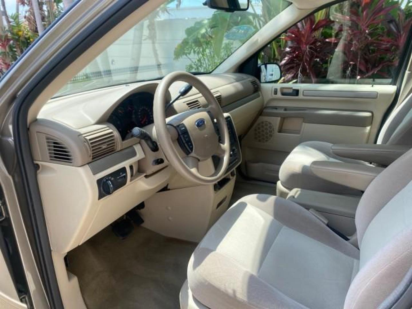 2006 Arizona Beige Metallic /Pebble Ford Freestar Wagon SE LOW MILES 57,712 (2FMZA51666B) with an 3.9L OHV V6 Engine engine, Automatic transmission, located at 4701 North Dixie Hwy, Pompano Beach, FL, 33064, (954) 422-2889, 26.240938, -80.123474 - OUR WEBPAGE FLORIDACARS1.COM HAS OVER 100 PHOTOS AND FREE CARFAX LINK 2006 FORD FREESTAR SE VIN: 2FMZA51666BA30658 2 F M Z A 5 1 6 6 6 B A 3 0 6 5 8 VAN 3.9L V6 F GASOLINE FRONT WHEEL DRIVE Top Features Cloth Seats Fold-Away Third Row Third Row Seat Basic Features ABS Brakes AM/FM Stereo Air Conditi - Photo#35