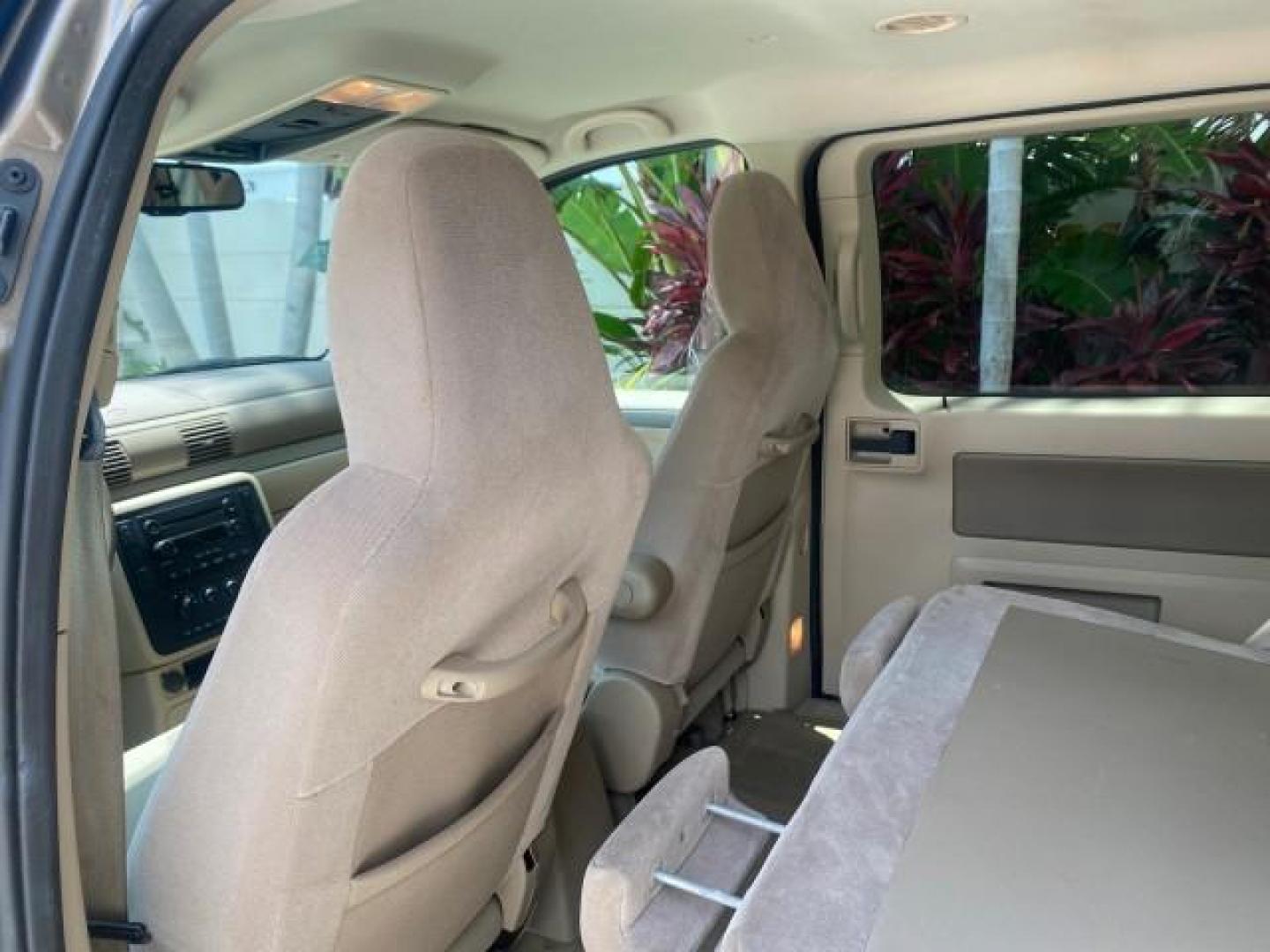 2006 Arizona Beige Metallic /Pebble Ford Freestar Wagon SE LOW MILES 57,712 (2FMZA51666B) with an 3.9L OHV V6 Engine engine, Automatic transmission, located at 4701 North Dixie Hwy, Pompano Beach, FL, 33064, (954) 422-2889, 26.240938, -80.123474 - OUR WEBPAGE FLORIDACARS1.COM HAS OVER 100 PHOTOS AND FREE CARFAX LINK 2006 FORD FREESTAR SE VIN: 2FMZA51666BA30658 2 F M Z A 5 1 6 6 6 B A 3 0 6 5 8 VAN 3.9L V6 F GASOLINE FRONT WHEEL DRIVE Top Features Cloth Seats Fold-Away Third Row Third Row Seat Basic Features ABS Brakes AM/FM Stereo Air Conditi - Photo#65