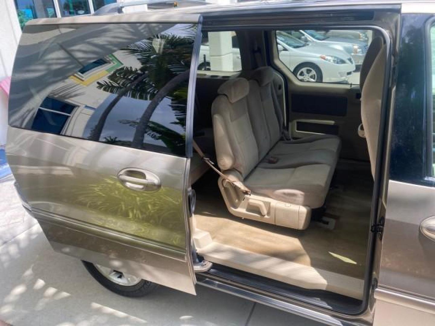 2006 Arizona Beige Metallic /Pebble Ford Freestar Wagon SE LOW MILES 57,712 (2FMZA51666B) with an 3.9L OHV V6 Engine engine, Automatic transmission, located at 4701 North Dixie Hwy, Pompano Beach, FL, 33064, (954) 422-2889, 26.240938, -80.123474 - OUR WEBPAGE FLORIDACARS1.COM HAS OVER 100 PHOTOS AND FREE CARFAX LINK 2006 FORD FREESTAR SE VIN: 2FMZA51666BA30658 2 F M Z A 5 1 6 6 6 B A 3 0 6 5 8 VAN 3.9L V6 F GASOLINE FRONT WHEEL DRIVE Top Features Cloth Seats Fold-Away Third Row Third Row Seat Basic Features ABS Brakes AM/FM Stereo Air Conditi - Photo#88