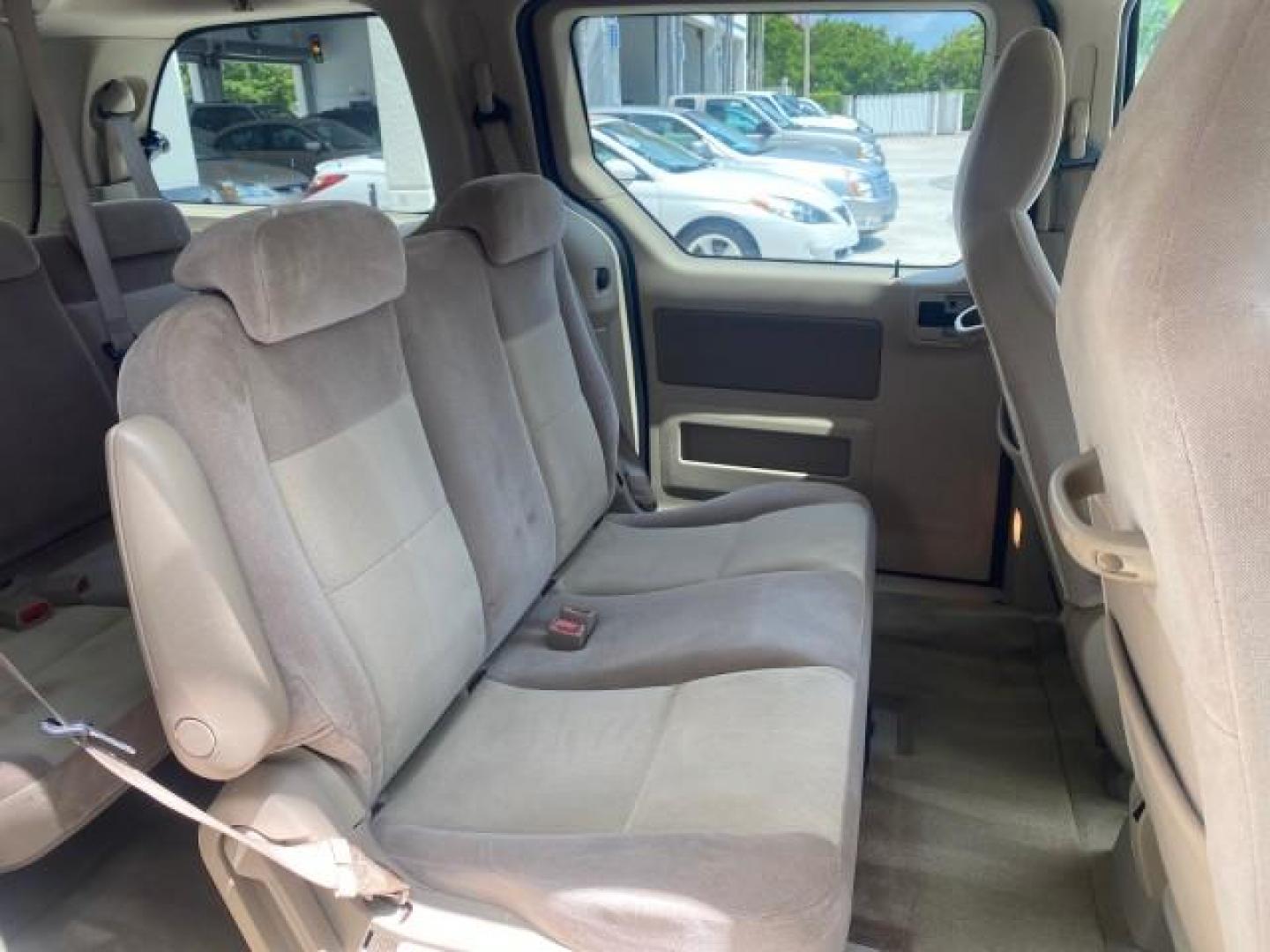 2006 Arizona Beige Metallic /Pebble Ford Freestar Wagon SE LOW MILES 57,712 (2FMZA51666B) with an 3.9L OHV V6 Engine engine, Automatic transmission, located at 4701 North Dixie Hwy, Pompano Beach, FL, 33064, (954) 422-2889, 26.240938, -80.123474 - OUR WEBPAGE FLORIDACARS1.COM HAS OVER 100 PHOTOS AND FREE CARFAX LINK 2006 FORD FREESTAR SE VIN: 2FMZA51666BA30658 2 F M Z A 5 1 6 6 6 B A 3 0 6 5 8 VAN 3.9L V6 F GASOLINE FRONT WHEEL DRIVE Top Features Cloth Seats Fold-Away Third Row Third Row Seat Basic Features ABS Brakes AM/FM Stereo Air Conditi - Photo#89