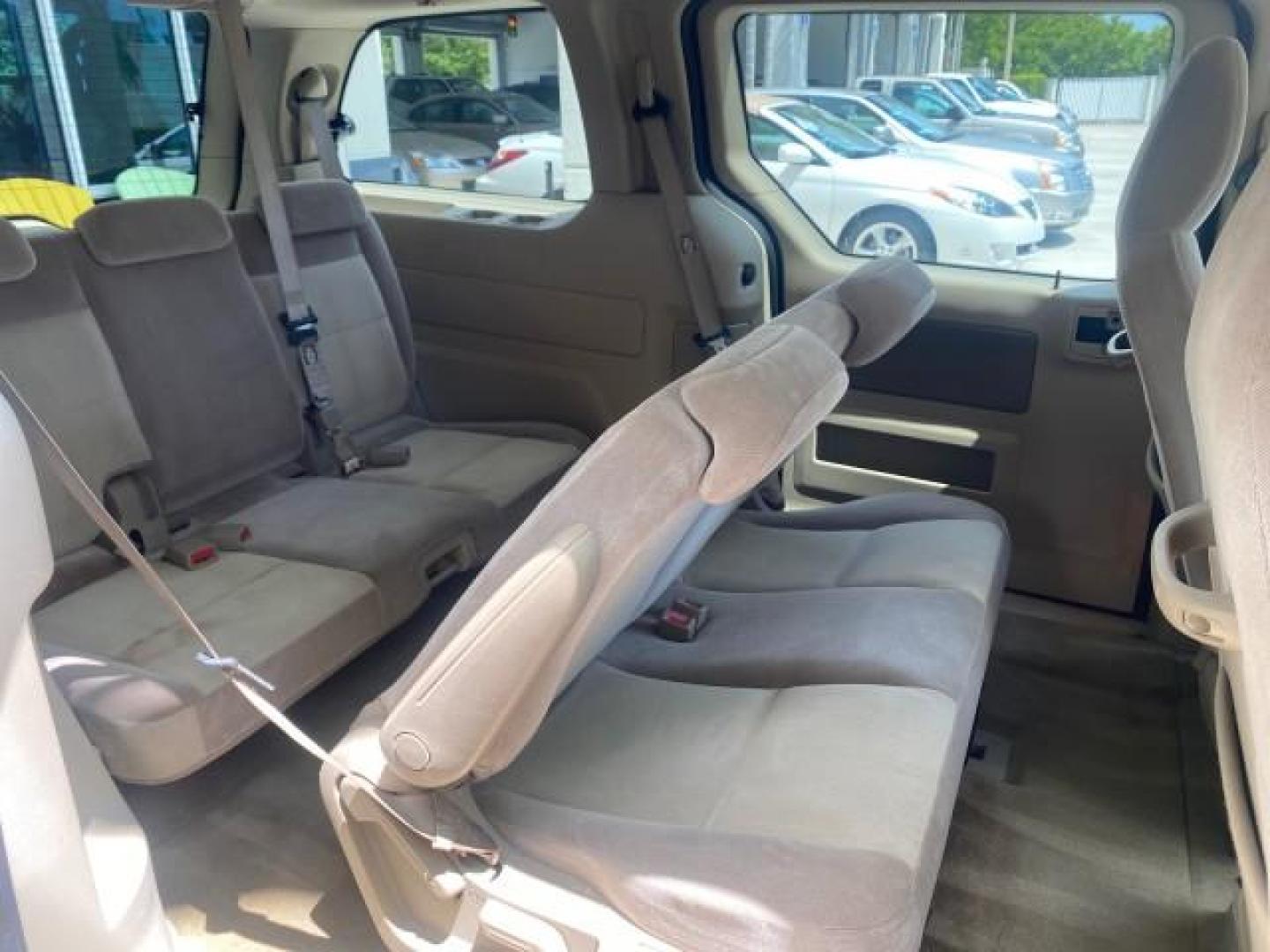 2006 Arizona Beige Metallic /Pebble Ford Freestar Wagon SE LOW MILES 57,712 (2FMZA51666B) with an 3.9L OHV V6 Engine engine, Automatic transmission, located at 4701 North Dixie Hwy, Pompano Beach, FL, 33064, (954) 422-2889, 26.240938, -80.123474 - OUR WEBPAGE FLORIDACARS1.COM HAS OVER 100 PHOTOS AND FREE CARFAX LINK 2006 FORD FREESTAR SE VIN: 2FMZA51666BA30658 2 F M Z A 5 1 6 6 6 B A 3 0 6 5 8 VAN 3.9L V6 F GASOLINE FRONT WHEEL DRIVE Top Features Cloth Seats Fold-Away Third Row Third Row Seat Basic Features ABS Brakes AM/FM Stereo Air Conditi - Photo#95