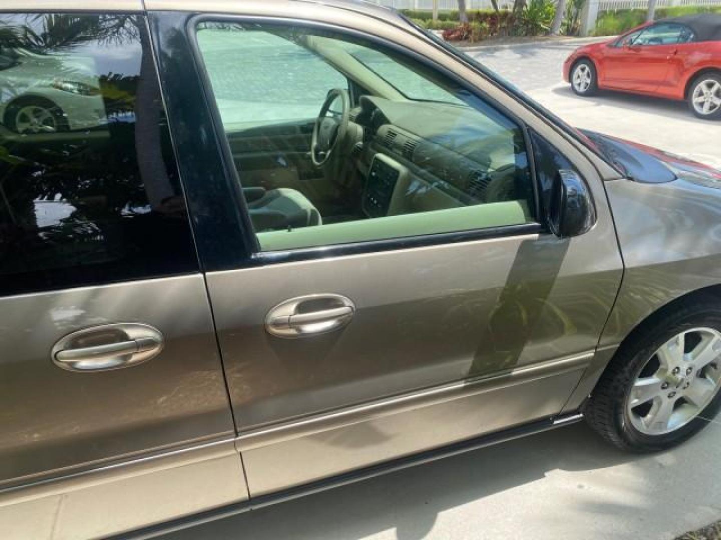 2006 Arizona Beige Metallic /Pebble Ford Freestar Wagon SE LOW MILES 57,712 (2FMZA51666B) with an 3.9L OHV V6 Engine engine, Automatic transmission, located at 4701 North Dixie Hwy, Pompano Beach, FL, 33064, (954) 422-2889, 26.240938, -80.123474 - OUR WEBPAGE FLORIDACARS1.COM HAS OVER 100 PHOTOS AND FREE CARFAX LINK 2006 FORD FREESTAR SE VIN: 2FMZA51666BA30658 2 F M Z A 5 1 6 6 6 B A 3 0 6 5 8 VAN 3.9L V6 F GASOLINE FRONT WHEEL DRIVE Top Features Cloth Seats Fold-Away Third Row Third Row Seat Basic Features ABS Brakes AM/FM Stereo Air Conditi - Photo#96