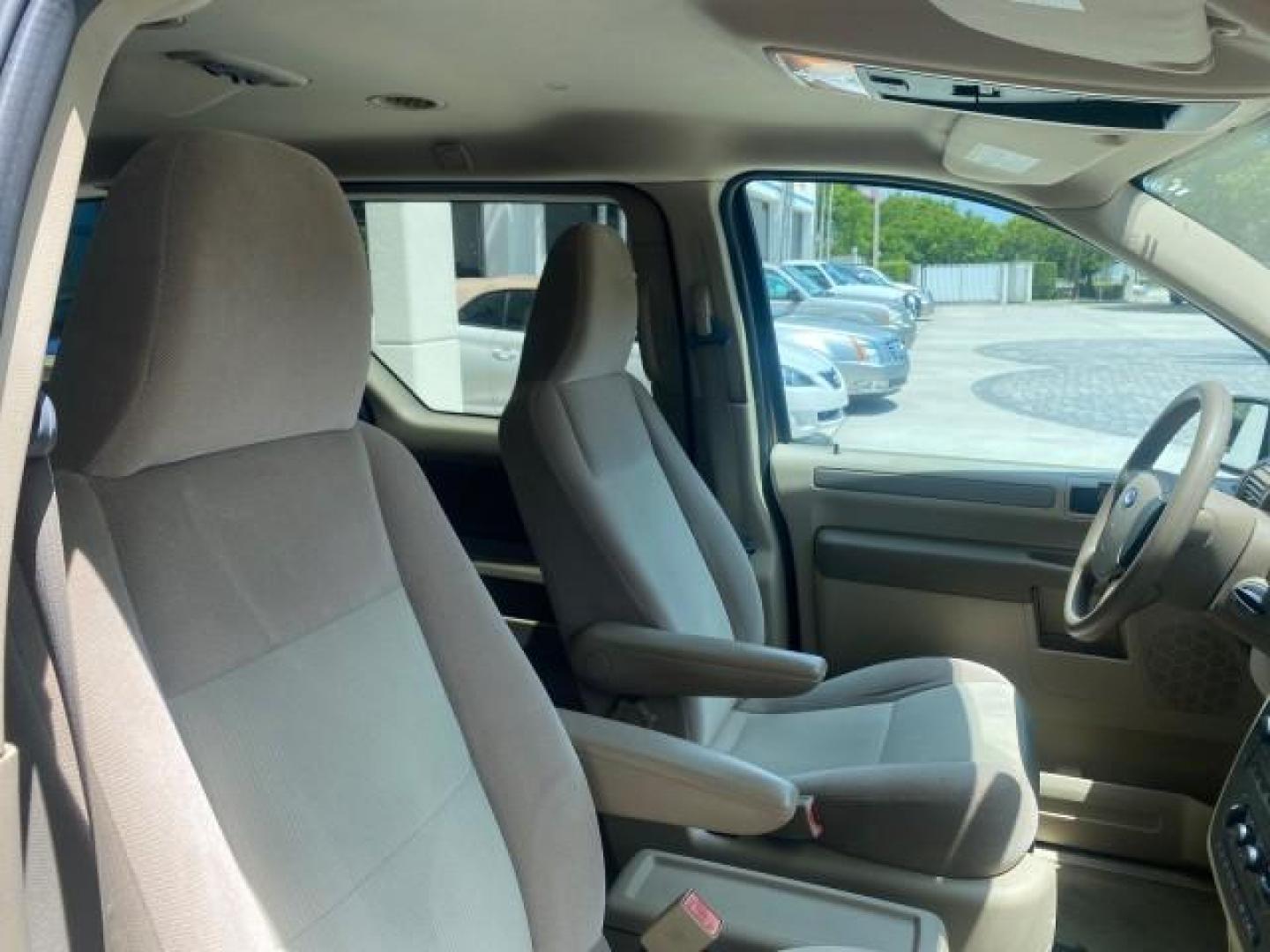 2006 Arizona Beige Metallic /Pebble Ford Freestar Wagon SE LOW MILES 57,712 (2FMZA51666B) with an 3.9L OHV V6 Engine engine, Automatic transmission, located at 4701 North Dixie Hwy, Pompano Beach, FL, 33064, (954) 422-2889, 26.240938, -80.123474 - OUR WEBPAGE FLORIDACARS1.COM HAS OVER 100 PHOTOS AND FREE CARFAX LINK 2006 FORD FREESTAR SE VIN: 2FMZA51666BA30658 2 F M Z A 5 1 6 6 6 B A 3 0 6 5 8 VAN 3.9L V6 F GASOLINE FRONT WHEEL DRIVE Top Features Cloth Seats Fold-Away Third Row Third Row Seat Basic Features ABS Brakes AM/FM Stereo Air Conditi - Photo#99