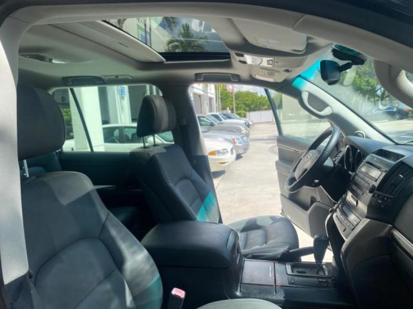 2008 Black /Medium Gray Toyota Land Cruiser LOOKS LIKE NEW 4WD (JTMHY05J984) with an 5.7L DOHC EFI 32-Valve V8 Engine engine, Automatic transmission, located at 4701 North Dixie Hwy, Pompano Beach, FL, 33064, (954) 422-2889, 26.240938, -80.123474 - OUR WEBPAGE FLORIDACARS1.COM HAS OVER 100 PHOTOS AND FREE CARFAX LINK 2008 TOYOTA LAND CRUISER VIN: JTMHY05J984000502 J T M H Y 0 5 J 9 8 4 0 0 0 5 0 2 4 DOOR WAGON/SPORT UTILITY 5.7L V8 F DOHC 32V GASOLINE ALL WHEEL DRIVE Top Features 4WD/AWD Alloy Wheels Fold-Away Third Row Front Seat Heaters JBL - Photo#12
