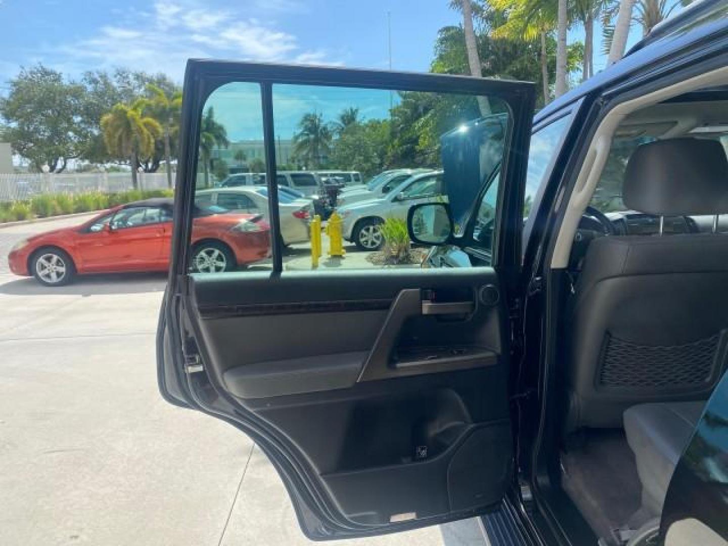 2008 Black /Medium Gray Toyota Land Cruiser LOOKS LIKE NEW 4WD (JTMHY05J984) with an 5.7L DOHC EFI 32-Valve V8 Engine engine, Automatic transmission, located at 4701 North Dixie Hwy, Pompano Beach, FL, 33064, (954) 422-2889, 26.240938, -80.123474 - OUR WEBPAGE FLORIDACARS1.COM HAS OVER 100 PHOTOS AND FREE CARFAX LINK 2008 TOYOTA LAND CRUISER VIN: JTMHY05J984000502 J T M H Y 0 5 J 9 8 4 0 0 0 5 0 2 4 DOOR WAGON/SPORT UTILITY 5.7L V8 F DOHC 32V GASOLINE ALL WHEEL DRIVE Top Features 4WD/AWD Alloy Wheels Fold-Away Third Row Front Seat Heaters JBL - Photo#13