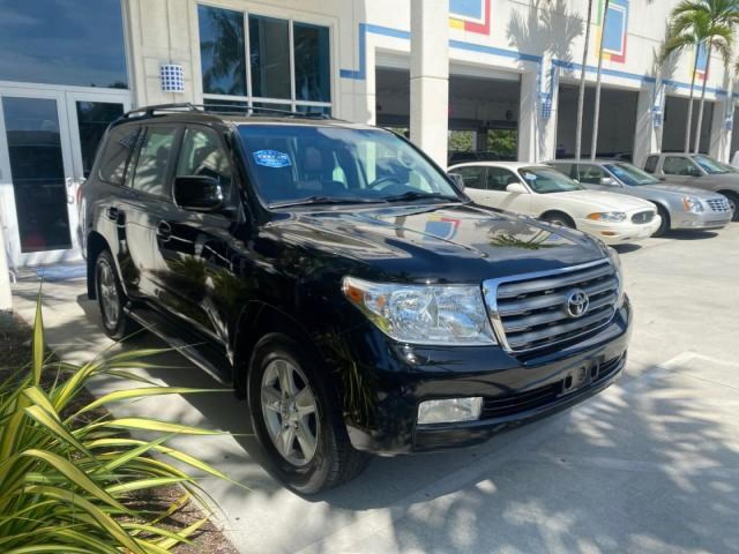 2008 Black /Medium Gray Toyota Land Cruiser LOOKS LIKE NEW 4WD (JTMHY05J984) with an 5.7L DOHC EFI 32-Valve V8 Engine engine, Automatic transmission, located at 4701 North Dixie Hwy, Pompano Beach, FL, 33064, (954) 422-2889, 26.240938, -80.123474 - OUR WEBPAGE FLORIDACARS1.COM HAS OVER 100 PHOTOS AND FREE CARFAX LINK 2008 TOYOTA LAND CRUISER VIN: JTMHY05J984000502 J T M H Y 0 5 J 9 8 4 0 0 0 5 0 2 4 DOOR WAGON/SPORT UTILITY 5.7L V8 F DOHC 32V GASOLINE ALL WHEEL DRIVE Top Features 4WD/AWD Alloy Wheels Fold-Away Third Row Front Seat Heaters JBL - Photo#24