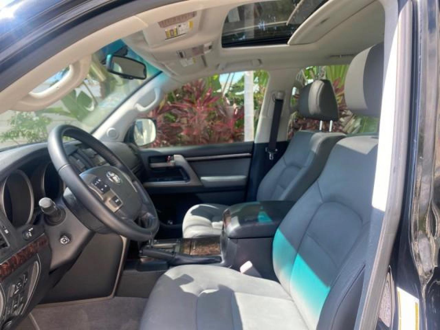 2008 Black /Medium Gray Toyota Land Cruiser LOOKS LIKE NEW 4WD (JTMHY05J984) with an 5.7L DOHC EFI 32-Valve V8 Engine engine, Automatic transmission, located at 4701 North Dixie Hwy, Pompano Beach, FL, 33064, (954) 422-2889, 26.240938, -80.123474 - OUR WEBPAGE FLORIDACARS1.COM HAS OVER 100 PHOTOS AND FREE CARFAX LINK 2008 TOYOTA LAND CRUISER VIN: JTMHY05J984000502 J T M H Y 0 5 J 9 8 4 0 0 0 5 0 2 4 DOOR WAGON/SPORT UTILITY 5.7L V8 F DOHC 32V GASOLINE ALL WHEEL DRIVE Top Features 4WD/AWD Alloy Wheels Fold-Away Third Row Front Seat Heaters JBL - Photo#34
