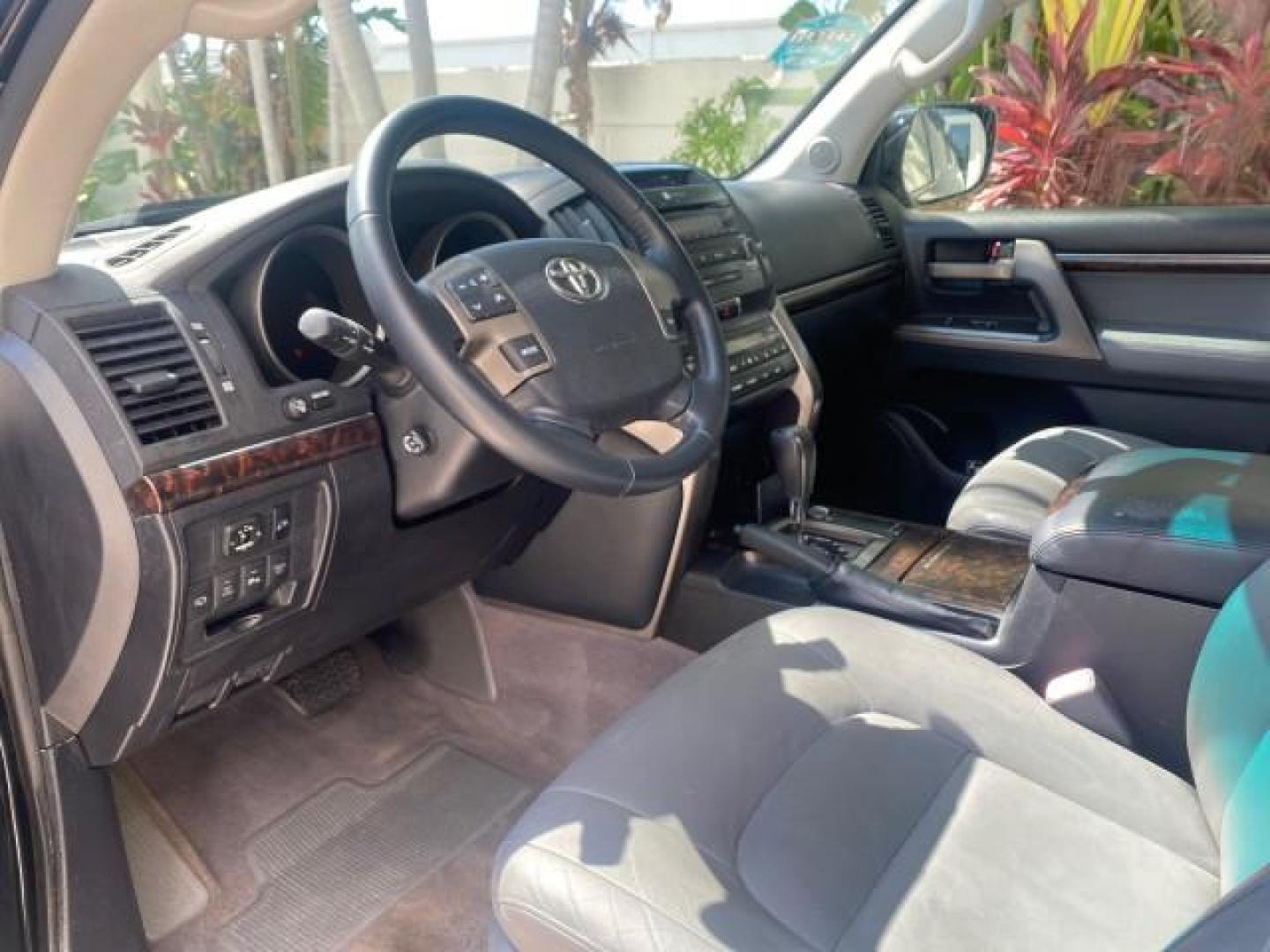 2008 Black /Medium Gray Toyota Land Cruiser LOOKS LIKE NEW 4WD (JTMHY05J984) with an 5.7L DOHC EFI 32-Valve V8 Engine engine, Automatic transmission, located at 4701 North Dixie Hwy, Pompano Beach, FL, 33064, (954) 422-2889, 26.240938, -80.123474 - OUR WEBPAGE FLORIDACARS1.COM HAS OVER 100 PHOTOS AND FREE CARFAX LINK 2008 TOYOTA LAND CRUISER VIN: JTMHY05J984000502 J T M H Y 0 5 J 9 8 4 0 0 0 5 0 2 4 DOOR WAGON/SPORT UTILITY 5.7L V8 F DOHC 32V GASOLINE ALL WHEEL DRIVE Top Features 4WD/AWD Alloy Wheels Fold-Away Third Row Front Seat Heaters JBL - Photo#37