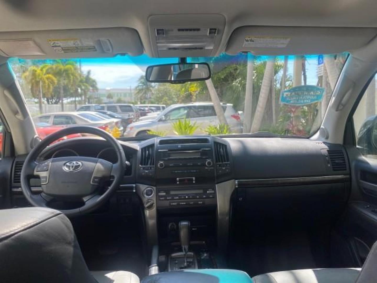 2008 Black /Medium Gray Toyota Land Cruiser LOOKS LIKE NEW 4WD (JTMHY05J984) with an 5.7L DOHC EFI 32-Valve V8 Engine engine, Automatic transmission, located at 4701 North Dixie Hwy, Pompano Beach, FL, 33064, (954) 422-2889, 26.240938, -80.123474 - OUR WEBPAGE FLORIDACARS1.COM HAS OVER 100 PHOTOS AND FREE CARFAX LINK 2008 TOYOTA LAND CRUISER VIN: JTMHY05J984000502 J T M H Y 0 5 J 9 8 4 0 0 0 5 0 2 4 DOOR WAGON/SPORT UTILITY 5.7L V8 F DOHC 32V GASOLINE ALL WHEEL DRIVE Top Features 4WD/AWD Alloy Wheels Fold-Away Third Row Front Seat Heaters JBL - Photo#70