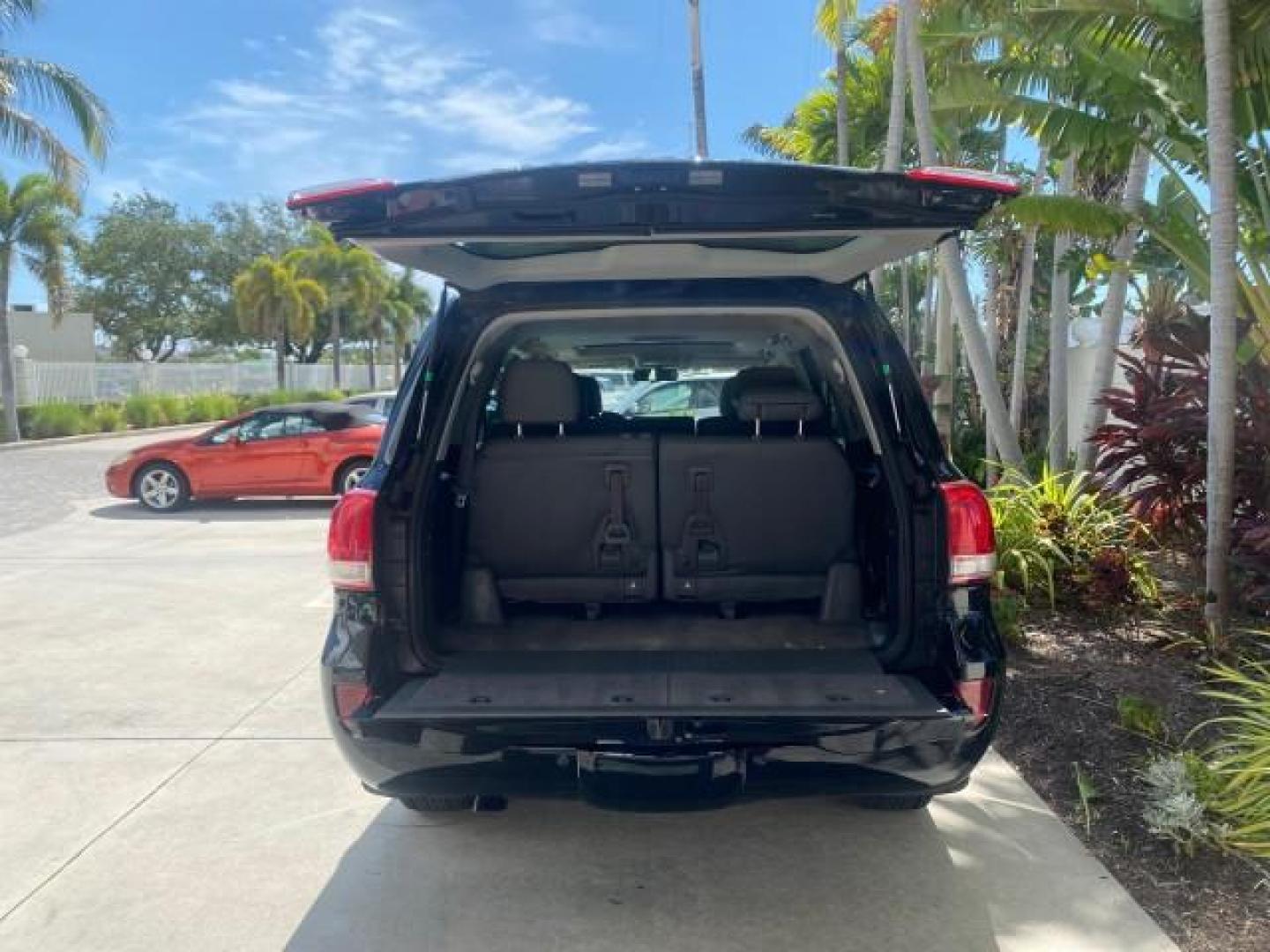 2008 Black /Medium Gray Toyota Land Cruiser LOOKS LIKE NEW 4WD (JTMHY05J984) with an 5.7L DOHC EFI 32-Valve V8 Engine engine, Automatic transmission, located at 4701 North Dixie Hwy, Pompano Beach, FL, 33064, (954) 422-2889, 26.240938, -80.123474 - OUR WEBPAGE FLORIDACARS1.COM HAS OVER 100 PHOTOS AND FREE CARFAX LINK 2008 TOYOTA LAND CRUISER VIN: JTMHY05J984000502 J T M H Y 0 5 J 9 8 4 0 0 0 5 0 2 4 DOOR WAGON/SPORT UTILITY 5.7L V8 F DOHC 32V GASOLINE ALL WHEEL DRIVE Top Features 4WD/AWD Alloy Wheels Fold-Away Third Row Front Seat Heaters JBL - Photo#83