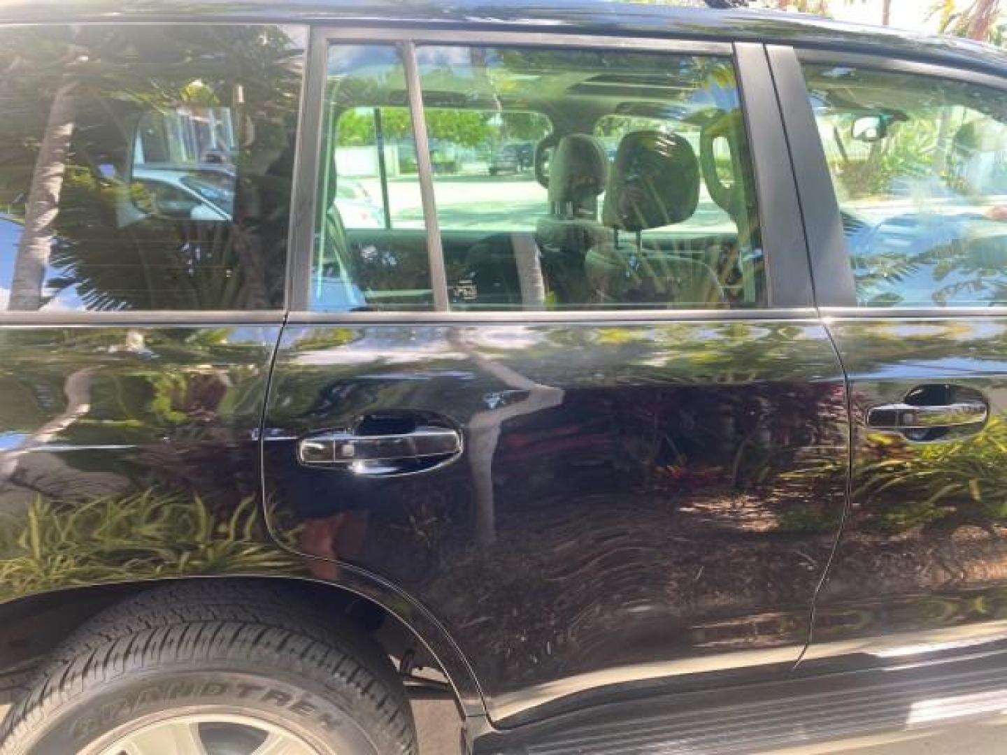 2008 Black /Medium Gray Toyota Land Cruiser LOOKS LIKE NEW 4WD (JTMHY05J984) with an 5.7L DOHC EFI 32-Valve V8 Engine engine, Automatic transmission, located at 4701 North Dixie Hwy, Pompano Beach, FL, 33064, (954) 422-2889, 26.240938, -80.123474 - OUR WEBPAGE FLORIDACARS1.COM HAS OVER 100 PHOTOS AND FREE CARFAX LINK 2008 TOYOTA LAND CRUISER VIN: JTMHY05J984000502 J T M H Y 0 5 J 9 8 4 0 0 0 5 0 2 4 DOOR WAGON/SPORT UTILITY 5.7L V8 F DOHC 32V GASOLINE ALL WHEEL DRIVE Top Features 4WD/AWD Alloy Wheels Fold-Away Third Row Front Seat Heaters JBL - Photo#95