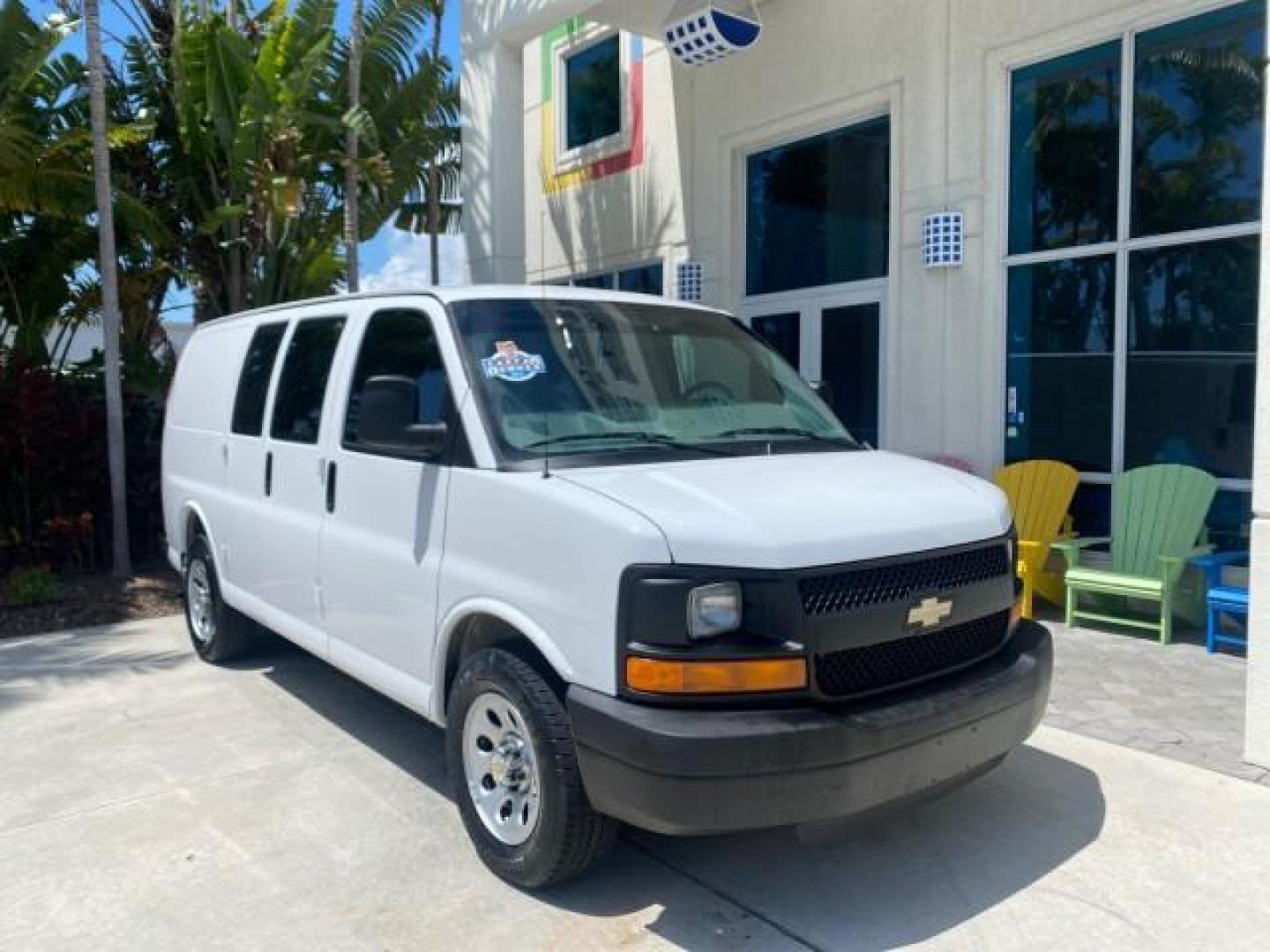 2013 Summit White /Medium Pewter Chevrolet Express Cargo Van LOW MILES 30,273 1 OWNER (1GCSGAFX7D1) with an 4.3L Vortec 1000 V6 MFI Engine engine, Automatic transmission, located at 4701 North Dixie Hwy, Pompano Beach, FL, 33064, (954) 422-2889, 26.240938, -80.123474 - OUR WEBPAGE FLORIDACARS1.COM HAS OVER 100 PHOTOS AND FREE CARFAX LINK 2013 CHEVROLET EXPRESS 1500 VIN: 1GCSGAFX7D1115905 1 G C S G A F X 7 D 1 1 1 5 9 0 5 VAN 4.3L V6 F OHV 12V GASOLINE REAR WHEEL DRIVE Top Features Rear Air Conditioning Vinyl Seats Basic Features ABS Brakes AM/FM Stereo Air Conditi - Photo#1