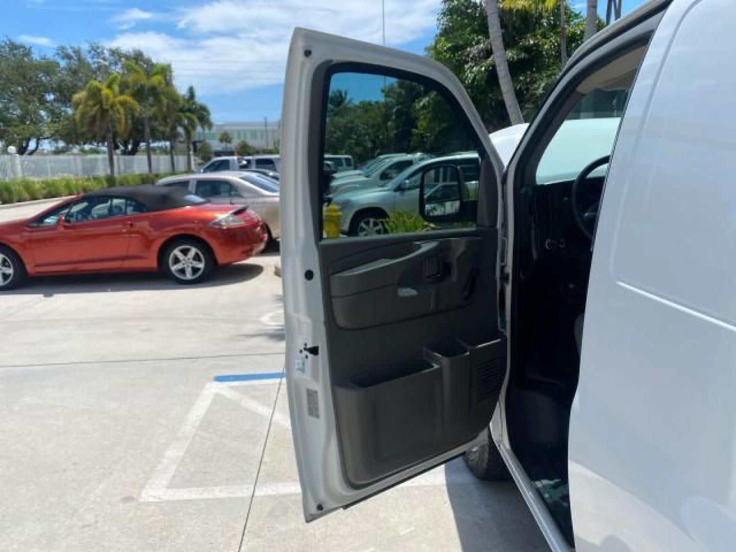 2013 Summit White /Medium Pewter Chevrolet Express Cargo Van LOW MILES 30,273 1 OWNER (1GCSGAFX7D1) with an 4.3L Vortec 1000 V6 MFI Engine engine, Automatic transmission, located at 4701 North Dixie Hwy, Pompano Beach, FL, 33064, (954) 422-2889, 26.240938, -80.123474 - OUR WEBPAGE FLORIDACARS1.COM HAS OVER 100 PHOTOS AND FREE CARFAX LINK 2013 CHEVROLET EXPRESS 1500 VIN: 1GCSGAFX7D1115905 1 G C S G A F X 7 D 1 1 1 5 9 0 5 VAN 4.3L V6 F OHV 12V GASOLINE REAR WHEEL DRIVE Top Features Rear Air Conditioning Vinyl Seats Basic Features ABS Brakes AM/FM Stereo Air Conditi - Photo#9