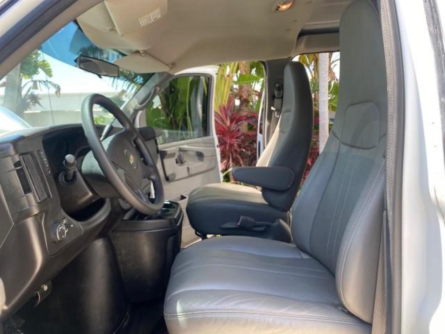2013 Summit White /Medium Pewter Chevrolet Express Cargo Van LOW MILES 30,273 1 OWNER (1GCSGAFX7D1) with an 4.3L Vortec 1000 V6 MFI Engine engine, Automatic transmission, located at 4701 North Dixie Hwy, Pompano Beach, FL, 33064, (954) 422-2889, 26.240938, -80.123474 - OUR WEBPAGE FLORIDACARS1.COM HAS OVER 100 PHOTOS AND FREE CARFAX LINK 2013 CHEVROLET EXPRESS 1500 VIN: 1GCSGAFX7D1115905 1 G C S G A F X 7 D 1 1 1 5 9 0 5 VAN 4.3L V6 F OHV 12V GASOLINE REAR WHEEL DRIVE Top Features Rear Air Conditioning Vinyl Seats Basic Features ABS Brakes AM/FM Stereo Air Conditi - Photo#10