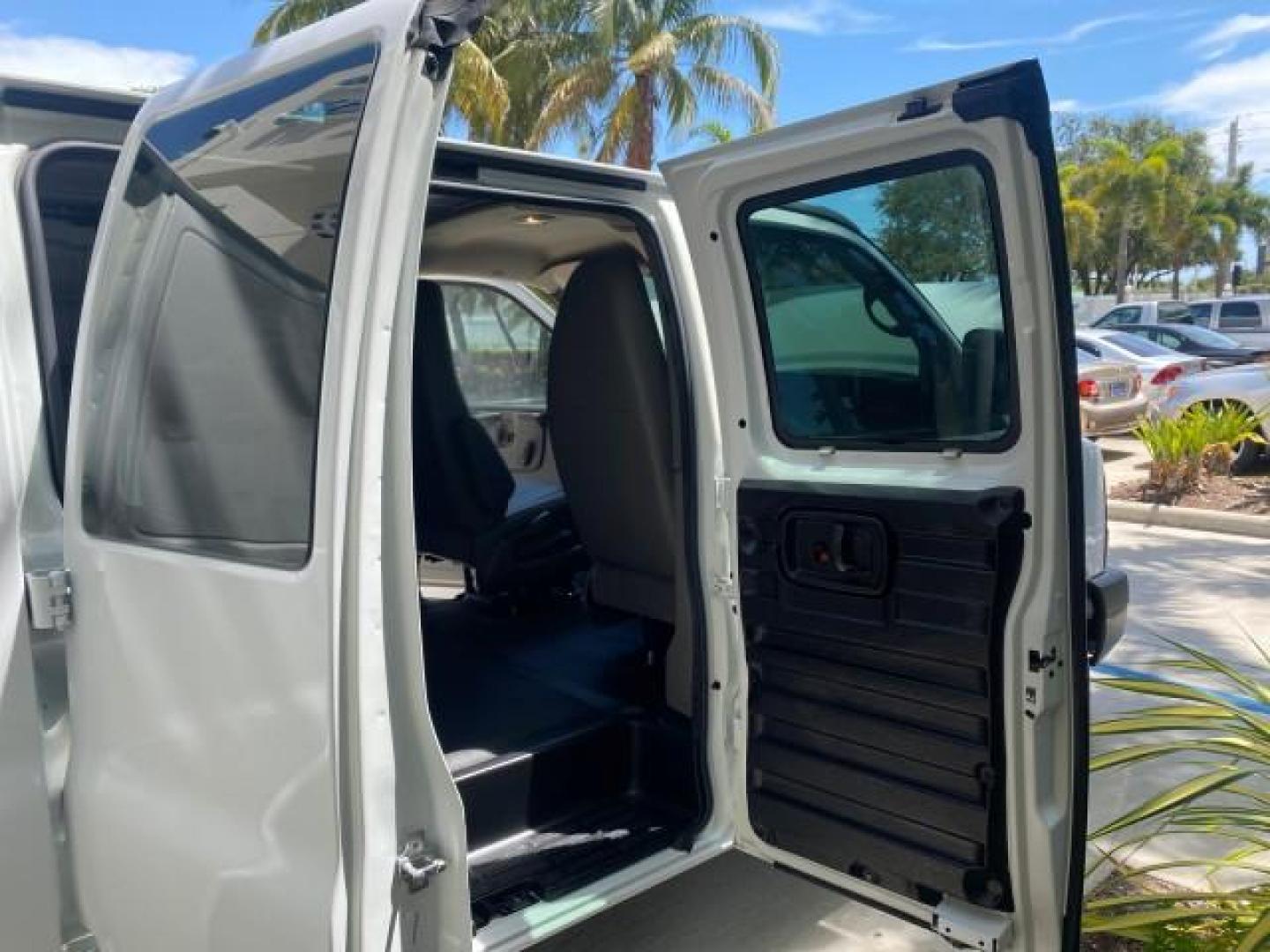 2013 Summit White /Medium Pewter Chevrolet Express Cargo Van LOW MILES 30,273 1 OWNER (1GCSGAFX7D1) with an 4.3L Vortec 1000 V6 MFI Engine engine, Automatic transmission, located at 4701 North Dixie Hwy, Pompano Beach, FL, 33064, (954) 422-2889, 26.240938, -80.123474 - OUR WEBPAGE FLORIDACARS1.COM HAS OVER 100 PHOTOS AND FREE CARFAX LINK 2013 CHEVROLET EXPRESS 1500 VIN: 1GCSGAFX7D1115905 1 G C S G A F X 7 D 1 1 1 5 9 0 5 VAN 4.3L V6 F OHV 12V GASOLINE REAR WHEEL DRIVE Top Features Rear Air Conditioning Vinyl Seats Basic Features ABS Brakes AM/FM Stereo Air Conditi - Photo#13
