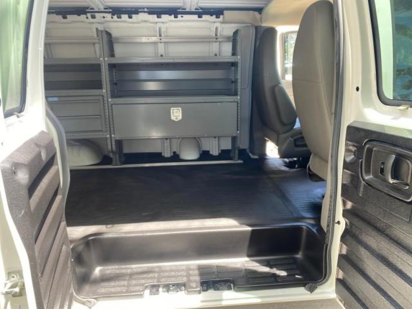 2013 Summit White /Medium Pewter Chevrolet Express Cargo Van LOW MILES 30,273 1 OWNER (1GCSGAFX7D1) with an 4.3L Vortec 1000 V6 MFI Engine engine, Automatic transmission, located at 4701 North Dixie Hwy, Pompano Beach, FL, 33064, (954) 422-2889, 26.240938, -80.123474 - OUR WEBPAGE FLORIDACARS1.COM HAS OVER 100 PHOTOS AND FREE CARFAX LINK 2013 CHEVROLET EXPRESS 1500 VIN: 1GCSGAFX7D1115905 1 G C S G A F X 7 D 1 1 1 5 9 0 5 VAN 4.3L V6 F OHV 12V GASOLINE REAR WHEEL DRIVE Top Features Rear Air Conditioning Vinyl Seats Basic Features ABS Brakes AM/FM Stereo Air Conditi - Photo#14