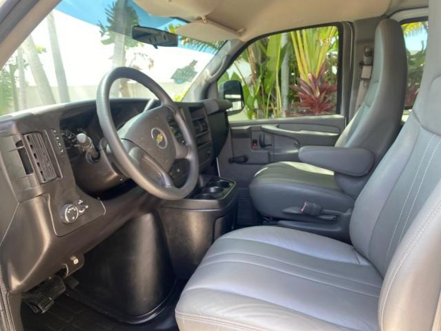 2013 Summit White /Medium Pewter Chevrolet Express Cargo Van LOW MILES 30,273 1 OWNER (1GCSGAFX7D1) with an 4.3L Vortec 1000 V6 MFI Engine engine, Automatic transmission, located at 4701 North Dixie Hwy, Pompano Beach, FL, 33064, (954) 422-2889, 26.240938, -80.123474 - OUR WEBPAGE FLORIDACARS1.COM HAS OVER 100 PHOTOS AND FREE CARFAX LINK 2013 CHEVROLET EXPRESS 1500 VIN: 1GCSGAFX7D1115905 1 G C S G A F X 7 D 1 1 1 5 9 0 5 VAN 4.3L V6 F OHV 12V GASOLINE REAR WHEEL DRIVE Top Features Rear Air Conditioning Vinyl Seats Basic Features ABS Brakes AM/FM Stereo Air Conditi - Photo#36