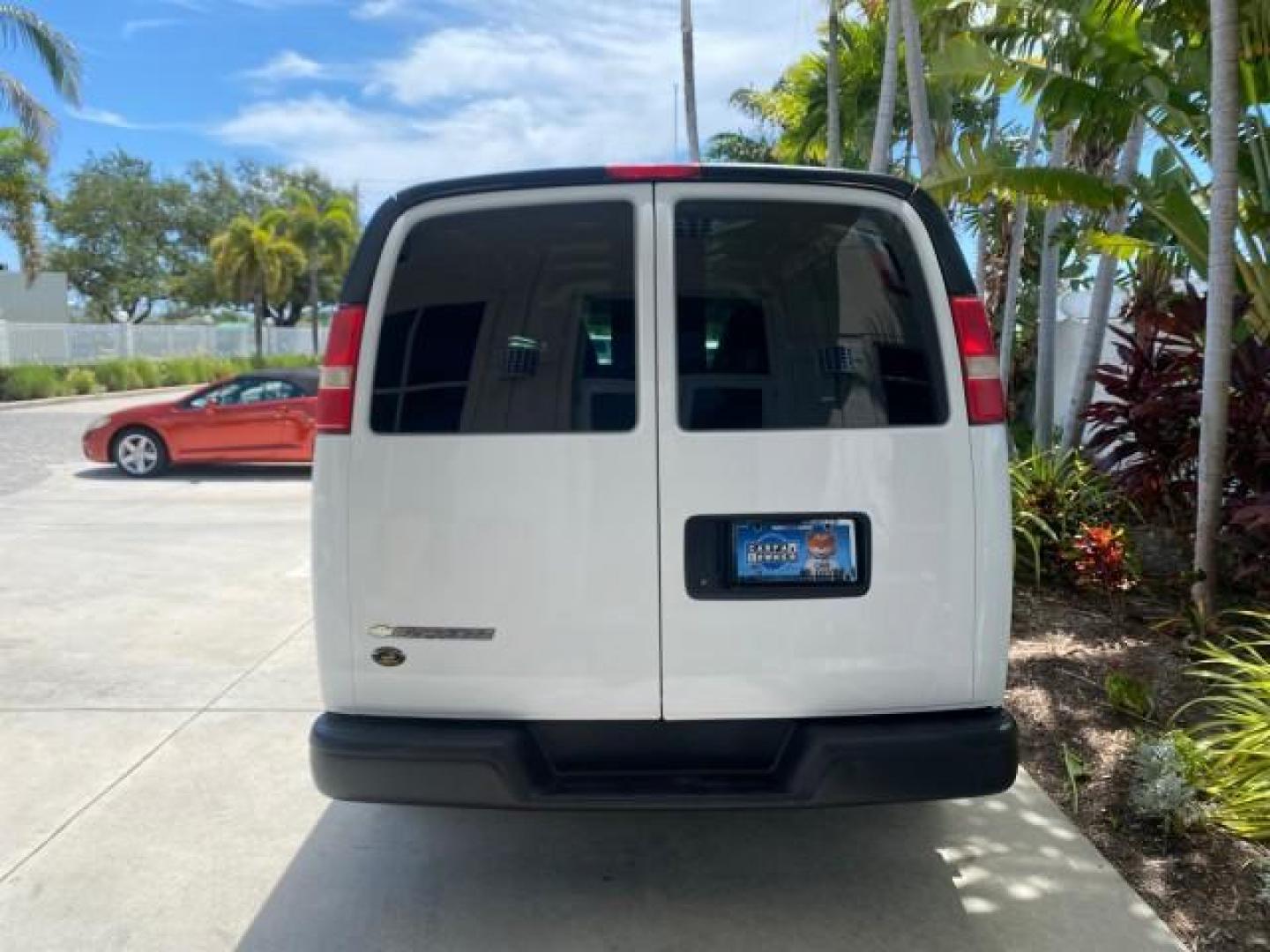 2013 Summit White /Medium Pewter Chevrolet Express Cargo Van LOW MILES 30,273 1 OWNER (1GCSGAFX7D1) with an 4.3L Vortec 1000 V6 MFI Engine engine, Automatic transmission, located at 4701 North Dixie Hwy, Pompano Beach, FL, 33064, (954) 422-2889, 26.240938, -80.123474 - OUR WEBPAGE FLORIDACARS1.COM HAS OVER 100 PHOTOS AND FREE CARFAX LINK 2013 CHEVROLET EXPRESS 1500 VIN: 1GCSGAFX7D1115905 1 G C S G A F X 7 D 1 1 1 5 9 0 5 VAN 4.3L V6 F OHV 12V GASOLINE REAR WHEEL DRIVE Top Features Rear Air Conditioning Vinyl Seats Basic Features ABS Brakes AM/FM Stereo Air Conditi - Photo#67