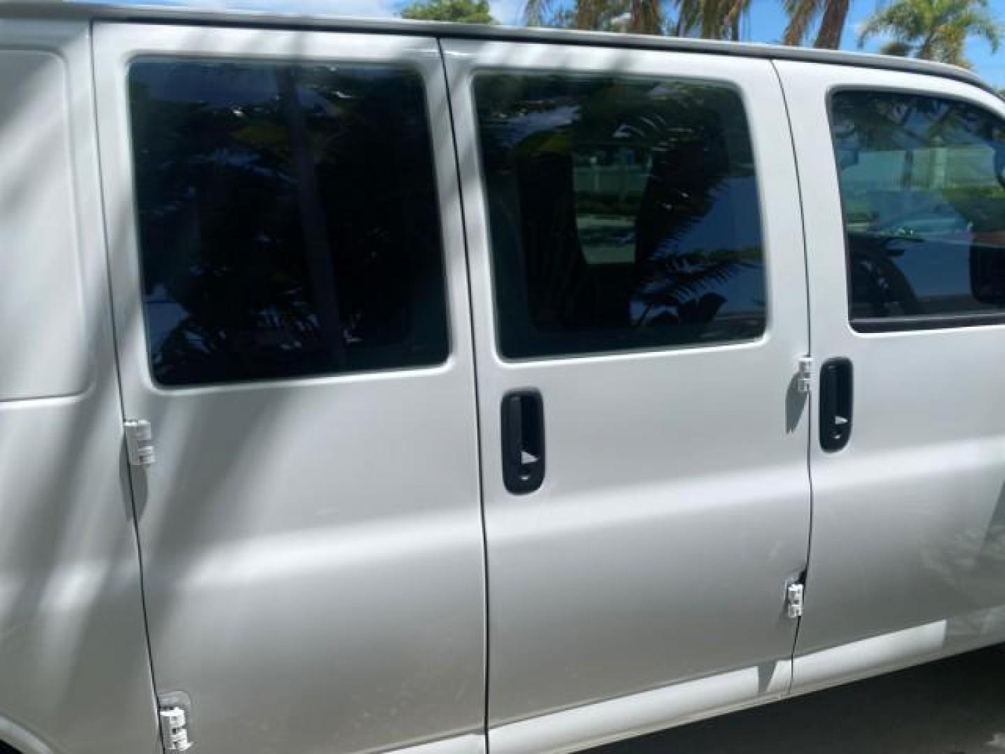 2013 Summit White /Medium Pewter Chevrolet Express Cargo Van LOW MILES 30,273 1 OWNER (1GCSGAFX7D1) with an 4.3L Vortec 1000 V6 MFI Engine engine, Automatic transmission, located at 4701 North Dixie Hwy, Pompano Beach, FL, 33064, (954) 422-2889, 26.240938, -80.123474 - OUR WEBPAGE FLORIDACARS1.COM HAS OVER 100 PHOTOS AND FREE CARFAX LINK 2013 CHEVROLET EXPRESS 1500 VIN: 1GCSGAFX7D1115905 1 G C S G A F X 7 D 1 1 1 5 9 0 5 VAN 4.3L V6 F OHV 12V GASOLINE REAR WHEEL DRIVE Top Features Rear Air Conditioning Vinyl Seats Basic Features ABS Brakes AM/FM Stereo Air Conditi - Photo#81