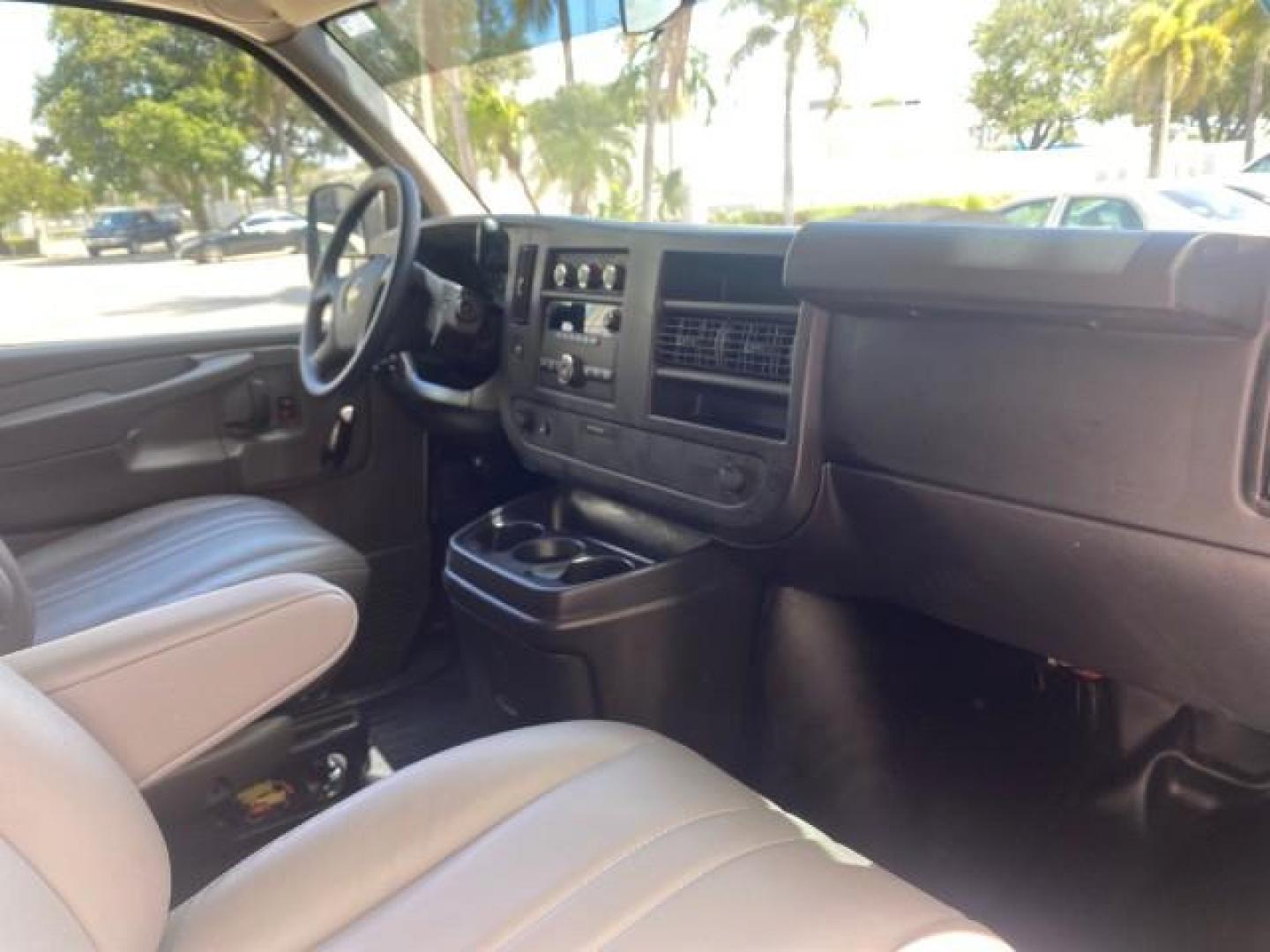 2013 Summit White /Medium Pewter Chevrolet Express Cargo Van LOW MILES 30,273 1 OWNER (1GCSGAFX7D1) with an 4.3L Vortec 1000 V6 MFI Engine engine, Automatic transmission, located at 4701 North Dixie Hwy, Pompano Beach, FL, 33064, (954) 422-2889, 26.240938, -80.123474 - OUR WEBPAGE FLORIDACARS1.COM HAS OVER 100 PHOTOS AND FREE CARFAX LINK 2013 CHEVROLET EXPRESS 1500 VIN: 1GCSGAFX7D1115905 1 G C S G A F X 7 D 1 1 1 5 9 0 5 VAN 4.3L V6 F OHV 12V GASOLINE REAR WHEEL DRIVE Top Features Rear Air Conditioning Vinyl Seats Basic Features ABS Brakes AM/FM Stereo Air Conditi - Photo#96