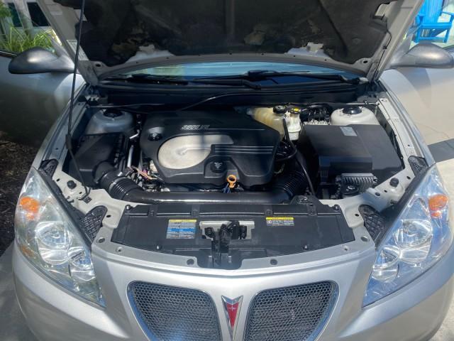 2007 Granite Metallic /Ebony Pontiac G6 GT LOW MILES 48,961 1 OWNER (1G2ZH361674) with an 3.9L V6 SFI Engine engine, Automatic transmission, located at 4701 North Dixie Hwy, Pompano Beach, FL, 33064, (954) 422-2889, 26.240938, -80.123474 - OUR WEBPAGE FLORIDACARS1.COM HAS OVER 100 PHOTOS AND FREE CARFAX LINK 2007 PONTIAC G6 GT VIN: 1G2ZH361674264591 1 G 2 Z H 3 6 1 6 7 4 2 6 4 5 9 1 CONVERTIBLE 3.9L V6 F GASOLINE FRONT WHEEL DRIVE Top Features Alloy Wheels Front Seat Heaters Hard Top Leather Seats Basic Features ABS Brakes AM/FM Stere - Photo#17