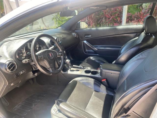 2007 Granite Metallic /Ebony Pontiac G6 GT LOW MILES 48,961 1 OWNER (1G2ZH361674) with an 3.9L V6 SFI Engine engine, Automatic transmission, located at 4701 North Dixie Hwy, Pompano Beach, FL, 33064, (954) 422-2889, 26.240938, -80.123474 - OUR WEBPAGE FLORIDACARS1.COM HAS OVER 100 PHOTOS AND FREE CARFAX LINK 2007 PONTIAC G6 GT VIN: 1G2ZH361674264591 1 G 2 Z H 3 6 1 6 7 4 2 6 4 5 9 1 CONVERTIBLE 3.9L V6 F GASOLINE FRONT WHEEL DRIVE Top Features Alloy Wheels Front Seat Heaters Hard Top Leather Seats Basic Features ABS Brakes AM/FM Stere - Photo#43