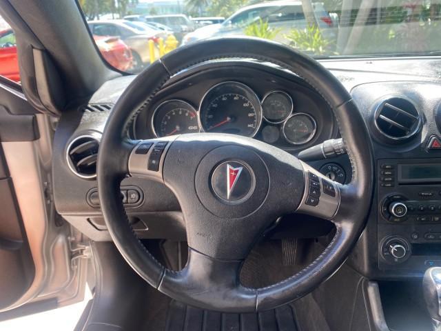 2007 Granite Metallic /Ebony Pontiac G6 GT LOW MILES 48,961 1 OWNER (1G2ZH361674) with an 3.9L V6 SFI Engine engine, Automatic transmission, located at 4701 North Dixie Hwy, Pompano Beach, FL, 33064, (954) 422-2889, 26.240938, -80.123474 - OUR WEBPAGE FLORIDACARS1.COM HAS OVER 100 PHOTOS AND FREE CARFAX LINK 2007 PONTIAC G6 GT VIN: 1G2ZH361674264591 1 G 2 Z H 3 6 1 6 7 4 2 6 4 5 9 1 CONVERTIBLE 3.9L V6 F GASOLINE FRONT WHEEL DRIVE Top Features Alloy Wheels Front Seat Heaters Hard Top Leather Seats Basic Features ABS Brakes AM/FM Stere - Photo#45