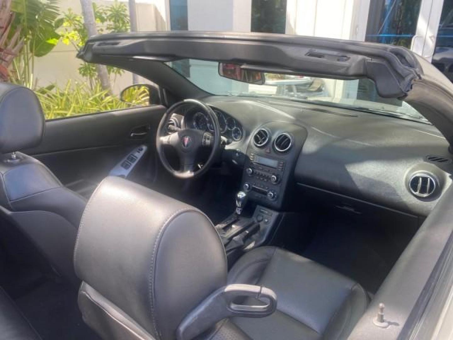 2007 Granite Metallic /Ebony Pontiac G6 GT LOW MILES 48,961 1 OWNER (1G2ZH361674) with an 3.9L V6 SFI Engine engine, Automatic transmission, located at 4701 North Dixie Hwy, Pompano Beach, FL, 33064, (954) 422-2889, 26.240938, -80.123474 - OUR WEBPAGE FLORIDACARS1.COM HAS OVER 100 PHOTOS AND FREE CARFAX LINK 2007 PONTIAC G6 GT VIN: 1G2ZH361674264591 1 G 2 Z H 3 6 1 6 7 4 2 6 4 5 9 1 CONVERTIBLE 3.9L V6 F GASOLINE FRONT WHEEL DRIVE Top Features Alloy Wheels Front Seat Heaters Hard Top Leather Seats Basic Features ABS Brakes AM/FM Stere - Photo#14