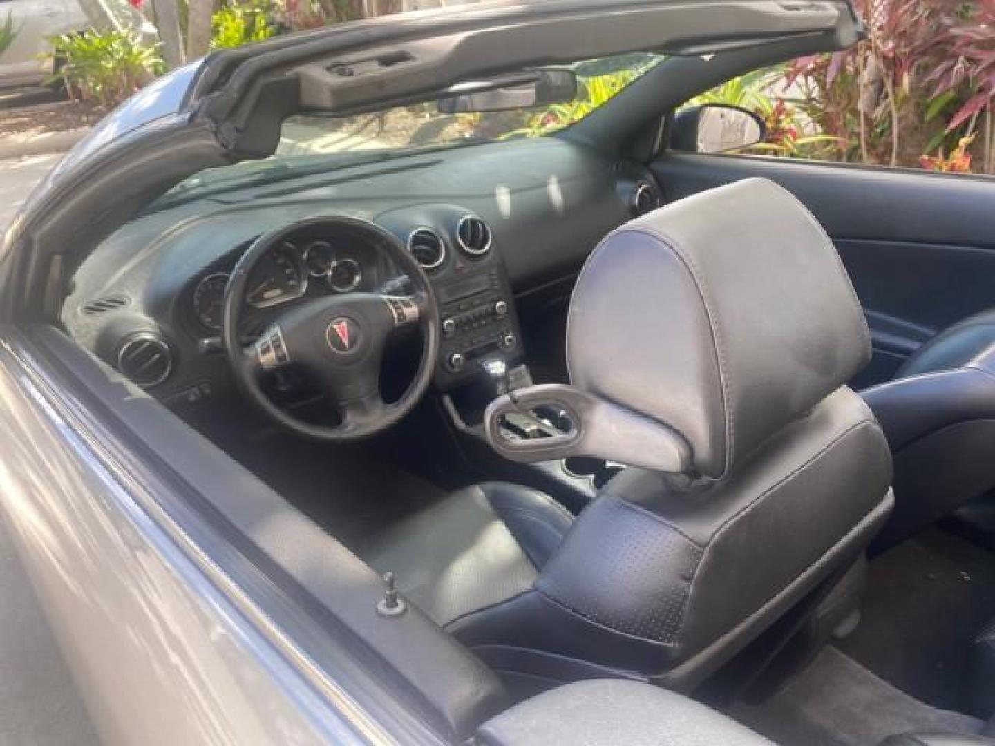 2007 Granite Metallic /Ebony Pontiac G6 GT LOW MILES 48,961 1 OWNER (1G2ZH361674) with an 3.9L V6 SFI Engine engine, Automatic transmission, located at 4701 North Dixie Hwy, Pompano Beach, FL, 33064, (954) 422-2889, 26.240938, -80.123474 - OUR WEBPAGE FLORIDACARS1.COM HAS OVER 100 PHOTOS AND FREE CARFAX LINK 2007 PONTIAC G6 GT VIN: 1G2ZH361674264591 1 G 2 Z H 3 6 1 6 7 4 2 6 4 5 9 1 CONVERTIBLE 3.9L V6 F GASOLINE FRONT WHEEL DRIVE Top Features Alloy Wheels Front Seat Heaters Hard Top Leather Seats Basic Features ABS Brakes AM/FM Stere - Photo#95