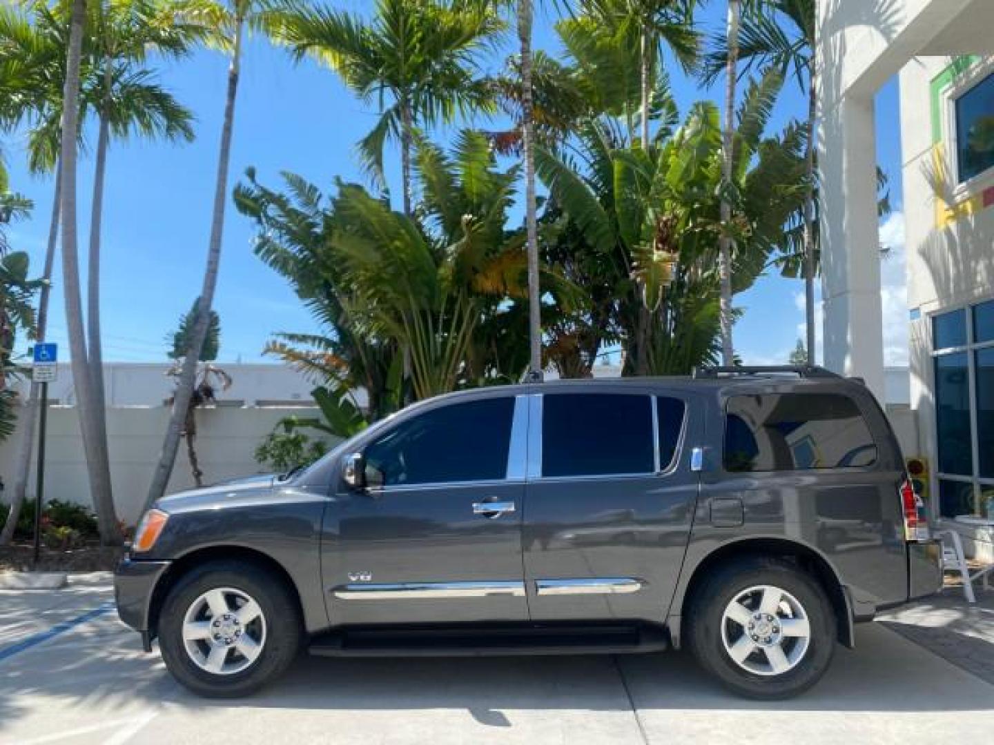2006 Smoke Metallic /Graphite/Titanium Nissan Armada SE 21 SERVICES NO ACCIDENTS (5N1AA08A96N) with an 5.6L DOHC 32-Valve Endurance V8 Engine engine, Automatic transmission, located at 4701 North Dixie Hwy, Pompano Beach, FL, 33064, (954) 422-2889, 26.240938, -80.123474 - OUR WEBPAGE FLORIDACARS1.COM HAS OVER 100 PHOTOS AND FREE CARFAX LINK 2006 NISSAN ARMADA SE VIN: 5N1AA08A96N736506 5 N 1 A A 0 8 A 9 6 N 7 3 6 5 0 6 4 DOOR WAGON/SPORT UTILITY 5.6L V8 F DOHC 32V GASOLINE REAR WHEEL DRIVE Top Features Alloy Wheels Cloth Seats Fold-Away Third Row Parking Sensors Rear - Photo#4