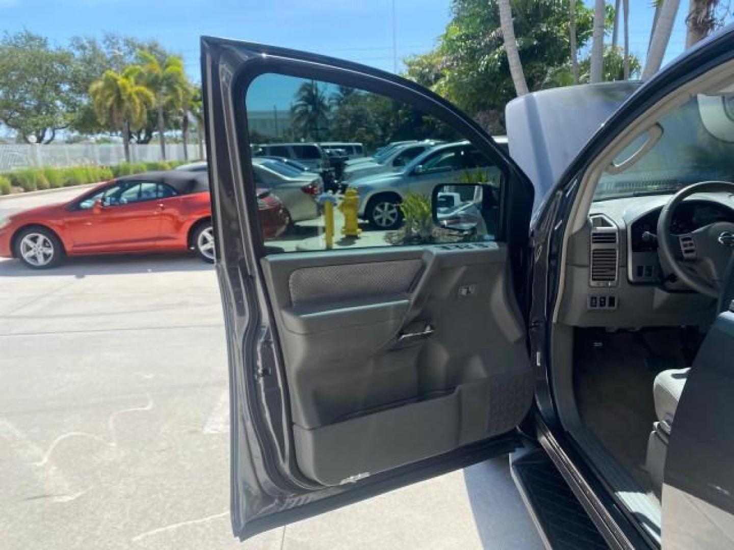 2006 Smoke Metallic /Graphite/Titanium Nissan Armada SE 21 SERVICES NO ACCIDENTS (5N1AA08A96N) with an 5.6L DOHC 32-Valve Endurance V8 Engine engine, Automatic transmission, located at 4701 North Dixie Hwy, Pompano Beach, FL, 33064, (954) 422-2889, 26.240938, -80.123474 - OUR WEBPAGE FLORIDACARS1.COM HAS OVER 100 PHOTOS AND FREE CARFAX LINK 2006 NISSAN ARMADA SE VIN: 5N1AA08A96N736506 5 N 1 A A 0 8 A 9 6 N 7 3 6 5 0 6 4 DOOR WAGON/SPORT UTILITY 5.6L V8 F DOHC 32V GASOLINE REAR WHEEL DRIVE Top Features Alloy Wheels Cloth Seats Fold-Away Third Row Parking Sensors Rear - Photo#9