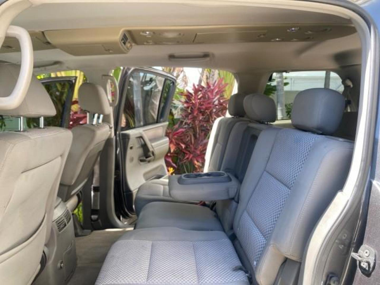 2006 Smoke Metallic /Graphite/Titanium Nissan Armada SE 21 SERVICES NO ACCIDENTS (5N1AA08A96N) with an 5.6L DOHC 32-Valve Endurance V8 Engine engine, Automatic transmission, located at 4701 North Dixie Hwy, Pompano Beach, FL, 33064, (954) 422-2889, 26.240938, -80.123474 - OUR WEBPAGE FLORIDACARS1.COM HAS OVER 100 PHOTOS AND FREE CARFAX LINK 2006 NISSAN ARMADA SE VIN: 5N1AA08A96N736506 5 N 1 A A 0 8 A 9 6 N 7 3 6 5 0 6 4 DOOR WAGON/SPORT UTILITY 5.6L V8 F DOHC 32V GASOLINE REAR WHEEL DRIVE Top Features Alloy Wheels Cloth Seats Fold-Away Third Row Parking Sensors Rear - Photo#14