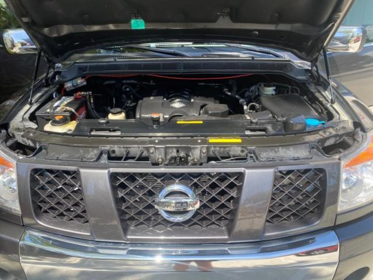 2006 Smoke Metallic /Graphite/Titanium Nissan Armada SE 21 SERVICES NO ACCIDENTS (5N1AA08A96N) with an 5.6L DOHC 32-Valve Endurance V8 Engine engine, Automatic transmission, located at 4701 North Dixie Hwy, Pompano Beach, FL, 33064, (954) 422-2889, 26.240938, -80.123474 - OUR WEBPAGE FLORIDACARS1.COM HAS OVER 100 PHOTOS AND FREE CARFAX LINK 2006 NISSAN ARMADA SE VIN: 5N1AA08A96N736506 5 N 1 A A 0 8 A 9 6 N 7 3 6 5 0 6 4 DOOR WAGON/SPORT UTILITY 5.6L V8 F DOHC 32V GASOLINE REAR WHEEL DRIVE Top Features Alloy Wheels Cloth Seats Fold-Away Third Row Parking Sensors Rear - Photo#17