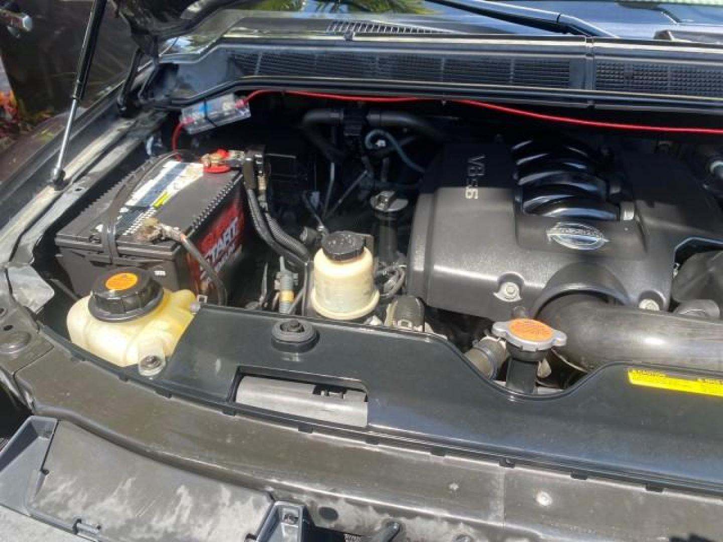 2006 Smoke Metallic /Graphite/Titanium Nissan Armada SE 21 SERVICES NO ACCIDENTS (5N1AA08A96N) with an 5.6L DOHC 32-Valve Endurance V8 Engine engine, Automatic transmission, located at 4701 North Dixie Hwy, Pompano Beach, FL, 33064, (954) 422-2889, 26.240938, -80.123474 - OUR WEBPAGE FLORIDACARS1.COM HAS OVER 100 PHOTOS AND FREE CARFAX LINK 2006 NISSAN ARMADA SE VIN: 5N1AA08A96N736506 5 N 1 A A 0 8 A 9 6 N 7 3 6 5 0 6 4 DOOR WAGON/SPORT UTILITY 5.6L V8 F DOHC 32V GASOLINE REAR WHEEL DRIVE Top Features Alloy Wheels Cloth Seats Fold-Away Third Row Parking Sensors Rear - Photo#25