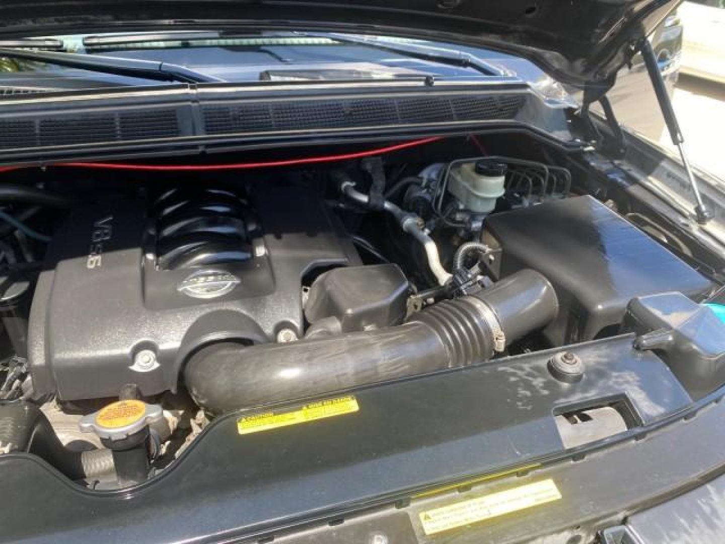 2006 Smoke Metallic /Graphite/Titanium Nissan Armada SE 21 SERVICES NO ACCIDENTS (5N1AA08A96N) with an 5.6L DOHC 32-Valve Endurance V8 Engine engine, Automatic transmission, located at 4701 North Dixie Hwy, Pompano Beach, FL, 33064, (954) 422-2889, 26.240938, -80.123474 - OUR WEBPAGE FLORIDACARS1.COM HAS OVER 100 PHOTOS AND FREE CARFAX LINK 2006 NISSAN ARMADA SE VIN: 5N1AA08A96N736506 5 N 1 A A 0 8 A 9 6 N 7 3 6 5 0 6 4 DOOR WAGON/SPORT UTILITY 5.6L V8 F DOHC 32V GASOLINE REAR WHEEL DRIVE Top Features Alloy Wheels Cloth Seats Fold-Away Third Row Parking Sensors Rear - Photo#26