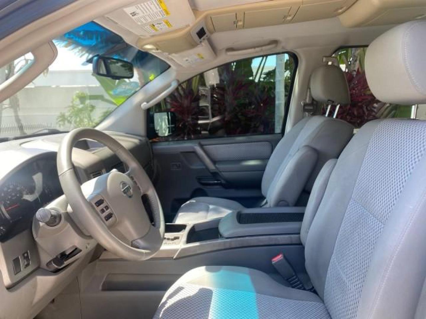 2006 Smoke Metallic /Graphite/Titanium Nissan Armada SE 21 SERVICES NO ACCIDENTS (5N1AA08A96N) with an 5.6L DOHC 32-Valve Endurance V8 Engine engine, Automatic transmission, located at 4701 North Dixie Hwy, Pompano Beach, FL, 33064, (954) 422-2889, 26.240938, -80.123474 - OUR WEBPAGE FLORIDACARS1.COM HAS OVER 100 PHOTOS AND FREE CARFAX LINK 2006 NISSAN ARMADA SE VIN: 5N1AA08A96N736506 5 N 1 A A 0 8 A 9 6 N 7 3 6 5 0 6 4 DOOR WAGON/SPORT UTILITY 5.6L V8 F DOHC 32V GASOLINE REAR WHEEL DRIVE Top Features Alloy Wheels Cloth Seats Fold-Away Third Row Parking Sensors Rear - Photo#35