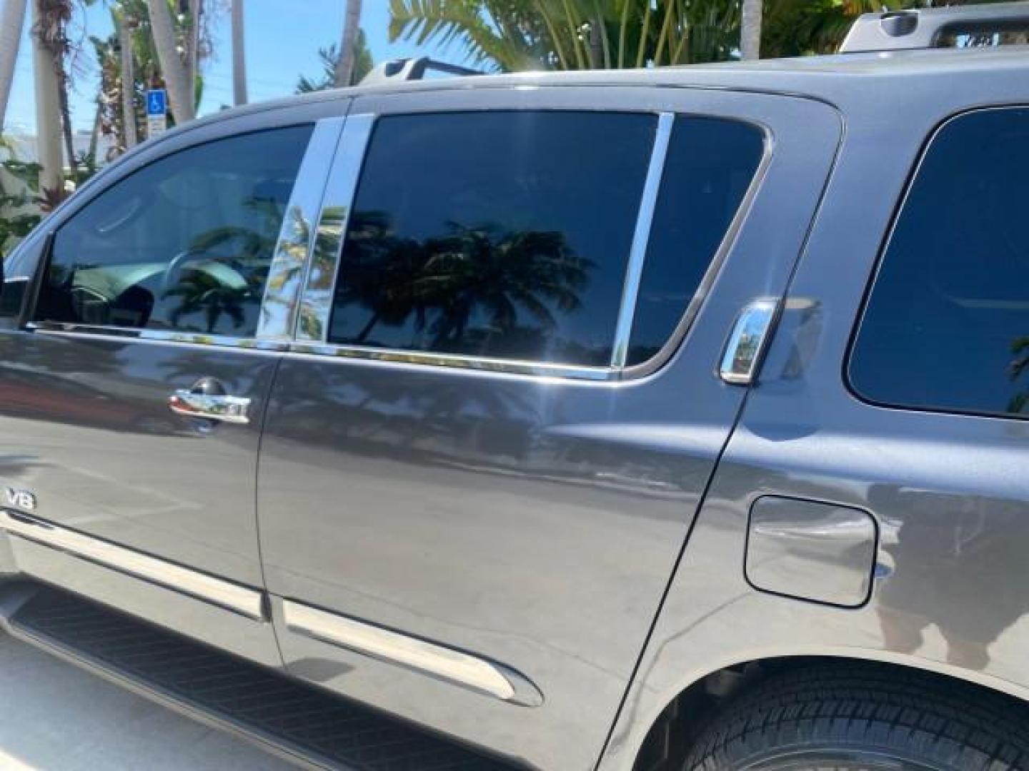 2006 Smoke Metallic /Graphite/Titanium Nissan Armada SE 21 SERVICES NO ACCIDENTS (5N1AA08A96N) with an 5.6L DOHC 32-Valve Endurance V8 Engine engine, Automatic transmission, located at 4701 North Dixie Hwy, Pompano Beach, FL, 33064, (954) 422-2889, 26.240938, -80.123474 - OUR WEBPAGE FLORIDACARS1.COM HAS OVER 100 PHOTOS AND FREE CARFAX LINK 2006 NISSAN ARMADA SE VIN: 5N1AA08A96N736506 5 N 1 A A 0 8 A 9 6 N 7 3 6 5 0 6 4 DOOR WAGON/SPORT UTILITY 5.6L V8 F DOHC 32V GASOLINE REAR WHEEL DRIVE Top Features Alloy Wheels Cloth Seats Fold-Away Third Row Parking Sensors Rear - Photo#60