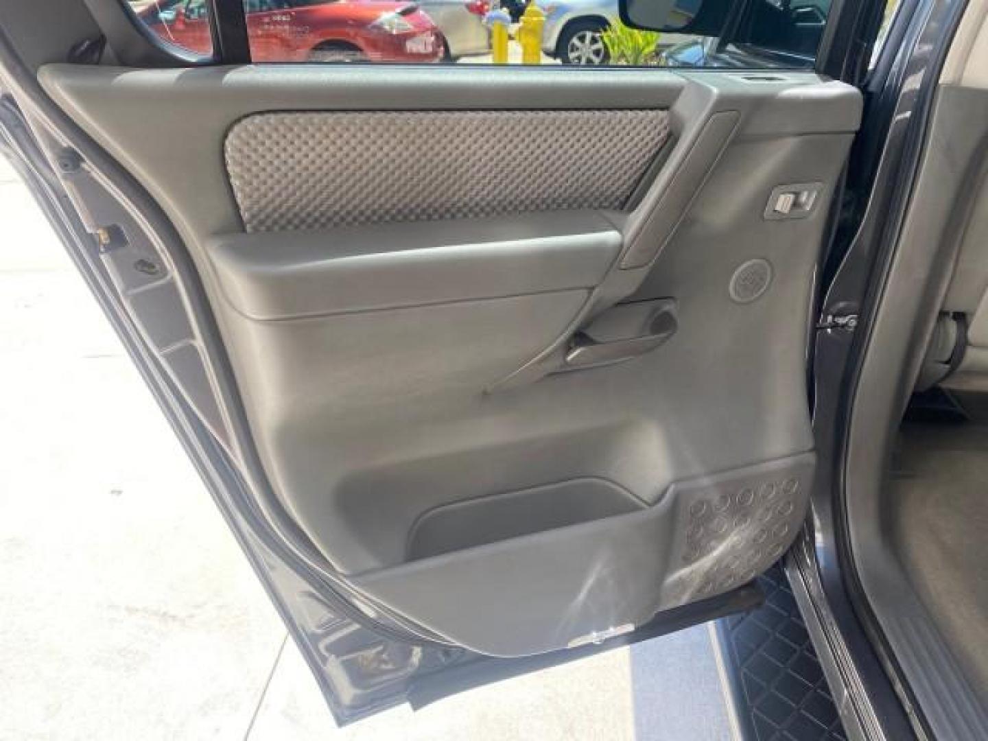 2006 Smoke Metallic /Graphite/Titanium Nissan Armada SE 21 SERVICES NO ACCIDENTS (5N1AA08A96N) with an 5.6L DOHC 32-Valve Endurance V8 Engine engine, Automatic transmission, located at 4701 North Dixie Hwy, Pompano Beach, FL, 33064, (954) 422-2889, 26.240938, -80.123474 - OUR WEBPAGE FLORIDACARS1.COM HAS OVER 100 PHOTOS AND FREE CARFAX LINK 2006 NISSAN ARMADA SE VIN: 5N1AA08A96N736506 5 N 1 A A 0 8 A 9 6 N 7 3 6 5 0 6 4 DOOR WAGON/SPORT UTILITY 5.6L V8 F DOHC 32V GASOLINE REAR WHEEL DRIVE Top Features Alloy Wheels Cloth Seats Fold-Away Third Row Parking Sensors Rear - Photo#63