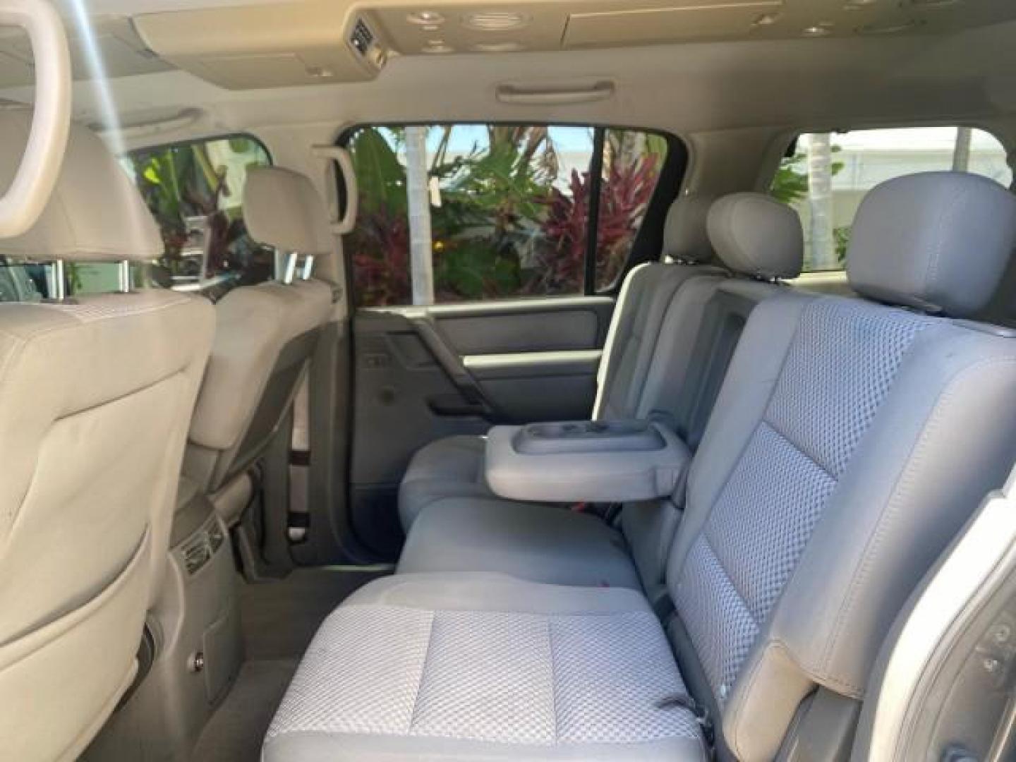 2006 Smoke Metallic /Graphite/Titanium Nissan Armada SE 21 SERVICES NO ACCIDENTS (5N1AA08A96N) with an 5.6L DOHC 32-Valve Endurance V8 Engine engine, Automatic transmission, located at 4701 North Dixie Hwy, Pompano Beach, FL, 33064, (954) 422-2889, 26.240938, -80.123474 - OUR WEBPAGE FLORIDACARS1.COM HAS OVER 100 PHOTOS AND FREE CARFAX LINK 2006 NISSAN ARMADA SE VIN: 5N1AA08A96N736506 5 N 1 A A 0 8 A 9 6 N 7 3 6 5 0 6 4 DOOR WAGON/SPORT UTILITY 5.6L V8 F DOHC 32V GASOLINE REAR WHEEL DRIVE Top Features Alloy Wheels Cloth Seats Fold-Away Third Row Parking Sensors Rear - Photo#65