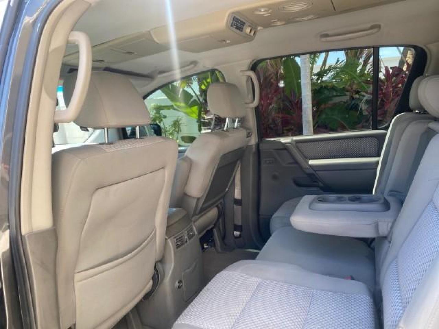 2006 Smoke Metallic /Graphite/Titanium Nissan Armada SE 21 SERVICES NO ACCIDENTS (5N1AA08A96N) with an 5.6L DOHC 32-Valve Endurance V8 Engine engine, Automatic transmission, located at 4701 North Dixie Hwy, Pompano Beach, FL, 33064, (954) 422-2889, 26.240938, -80.123474 - OUR WEBPAGE FLORIDACARS1.COM HAS OVER 100 PHOTOS AND FREE CARFAX LINK 2006 NISSAN ARMADA SE VIN: 5N1AA08A96N736506 5 N 1 A A 0 8 A 9 6 N 7 3 6 5 0 6 4 DOOR WAGON/SPORT UTILITY 5.6L V8 F DOHC 32V GASOLINE REAR WHEEL DRIVE Top Features Alloy Wheels Cloth Seats Fold-Away Third Row Parking Sensors Rear - Photo#67