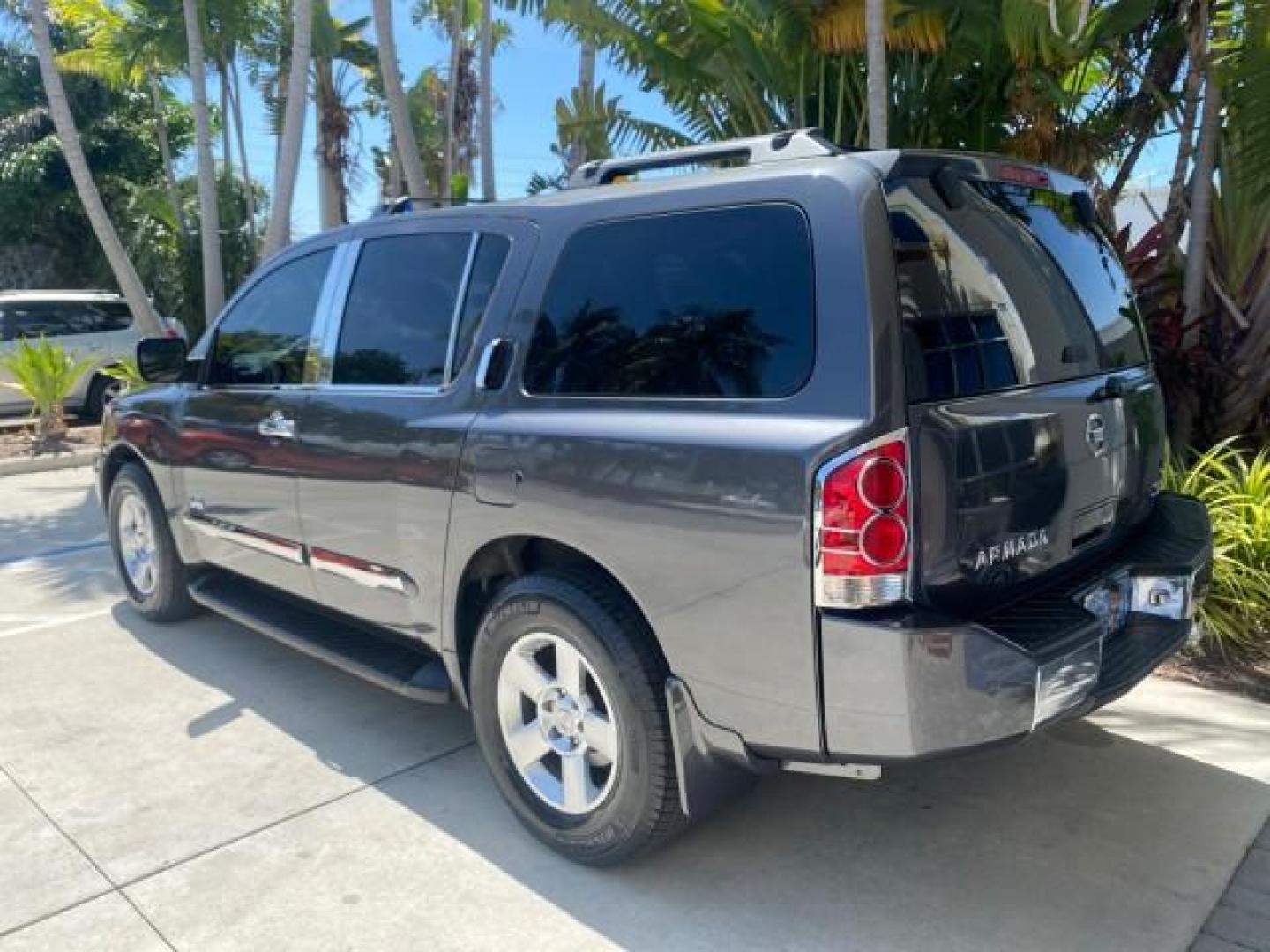 2006 Smoke Metallic /Graphite/Titanium Nissan Armada SE 21 SERVICES NO ACCIDENTS (5N1AA08A96N) with an 5.6L DOHC 32-Valve Endurance V8 Engine engine, Automatic transmission, located at 4701 North Dixie Hwy, Pompano Beach, FL, 33064, (954) 422-2889, 26.240938, -80.123474 - OUR WEBPAGE FLORIDACARS1.COM HAS OVER 100 PHOTOS AND FREE CARFAX LINK 2006 NISSAN ARMADA SE VIN: 5N1AA08A96N736506 5 N 1 A A 0 8 A 9 6 N 7 3 6 5 0 6 4 DOOR WAGON/SPORT UTILITY 5.6L V8 F DOHC 32V GASOLINE REAR WHEEL DRIVE Top Features Alloy Wheels Cloth Seats Fold-Away Third Row Parking Sensors Rear - Photo#82
