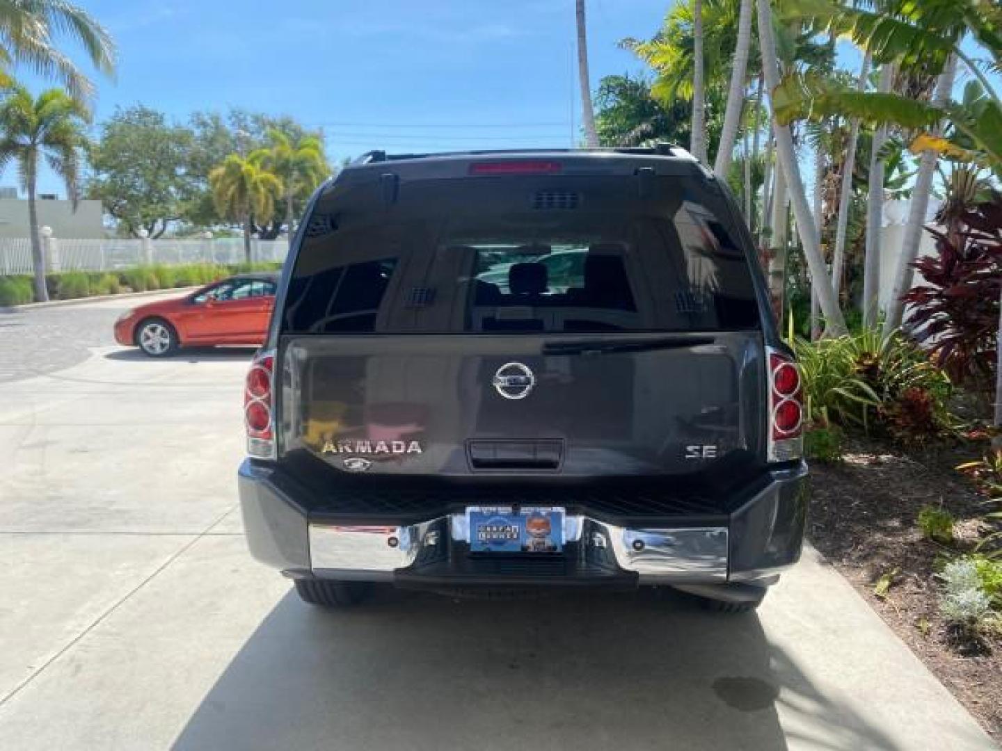 2006 Smoke Metallic /Graphite/Titanium Nissan Armada SE 21 SERVICES NO ACCIDENTS (5N1AA08A96N) with an 5.6L DOHC 32-Valve Endurance V8 Engine engine, Automatic transmission, located at 4701 North Dixie Hwy, Pompano Beach, FL, 33064, (954) 422-2889, 26.240938, -80.123474 - OUR WEBPAGE FLORIDACARS1.COM HAS OVER 100 PHOTOS AND FREE CARFAX LINK 2006 NISSAN ARMADA SE VIN: 5N1AA08A96N736506 5 N 1 A A 0 8 A 9 6 N 7 3 6 5 0 6 4 DOOR WAGON/SPORT UTILITY 5.6L V8 F DOHC 32V GASOLINE REAR WHEEL DRIVE Top Features Alloy Wheels Cloth Seats Fold-Away Third Row Parking Sensors Rear - Photo#83