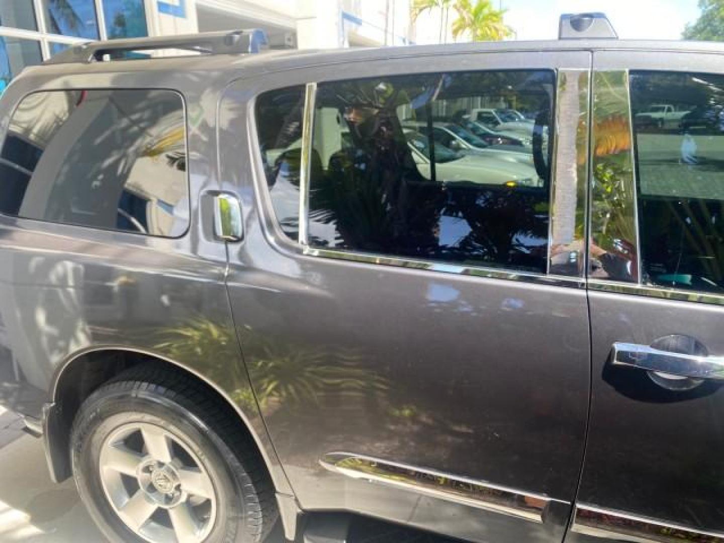 2006 Smoke Metallic /Graphite/Titanium Nissan Armada SE 21 SERVICES NO ACCIDENTS (5N1AA08A96N) with an 5.6L DOHC 32-Valve Endurance V8 Engine engine, Automatic transmission, located at 4701 North Dixie Hwy, Pompano Beach, FL, 33064, (954) 422-2889, 26.240938, -80.123474 - OUR WEBPAGE FLORIDACARS1.COM HAS OVER 100 PHOTOS AND FREE CARFAX LINK 2006 NISSAN ARMADA SE VIN: 5N1AA08A96N736506 5 N 1 A A 0 8 A 9 6 N 7 3 6 5 0 6 4 DOOR WAGON/SPORT UTILITY 5.6L V8 F DOHC 32V GASOLINE REAR WHEEL DRIVE Top Features Alloy Wheels Cloth Seats Fold-Away Third Row Parking Sensors Rear - Photo#95