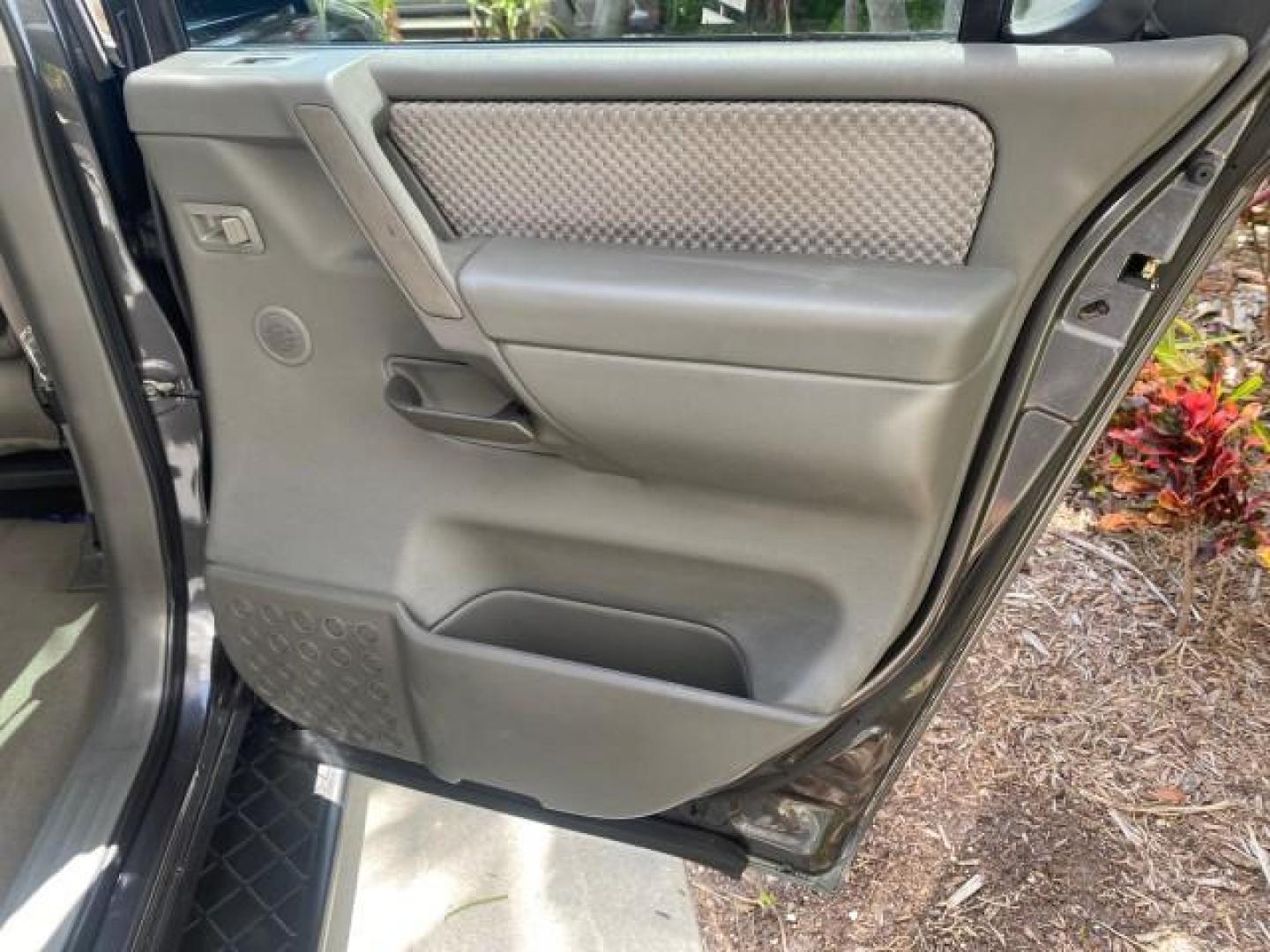 2006 Smoke Metallic /Graphite/Titanium Nissan Armada SE 21 SERVICES NO ACCIDENTS (5N1AA08A96N) with an 5.6L DOHC 32-Valve Endurance V8 Engine engine, Automatic transmission, located at 4701 North Dixie Hwy, Pompano Beach, FL, 33064, (954) 422-2889, 26.240938, -80.123474 - OUR WEBPAGE FLORIDACARS1.COM HAS OVER 100 PHOTOS AND FREE CARFAX LINK 2006 NISSAN ARMADA SE VIN: 5N1AA08A96N736506 5 N 1 A A 0 8 A 9 6 N 7 3 6 5 0 6 4 DOOR WAGON/SPORT UTILITY 5.6L V8 F DOHC 32V GASOLINE REAR WHEEL DRIVE Top Features Alloy Wheels Cloth Seats Fold-Away Third Row Parking Sensors Rear - Photo#97